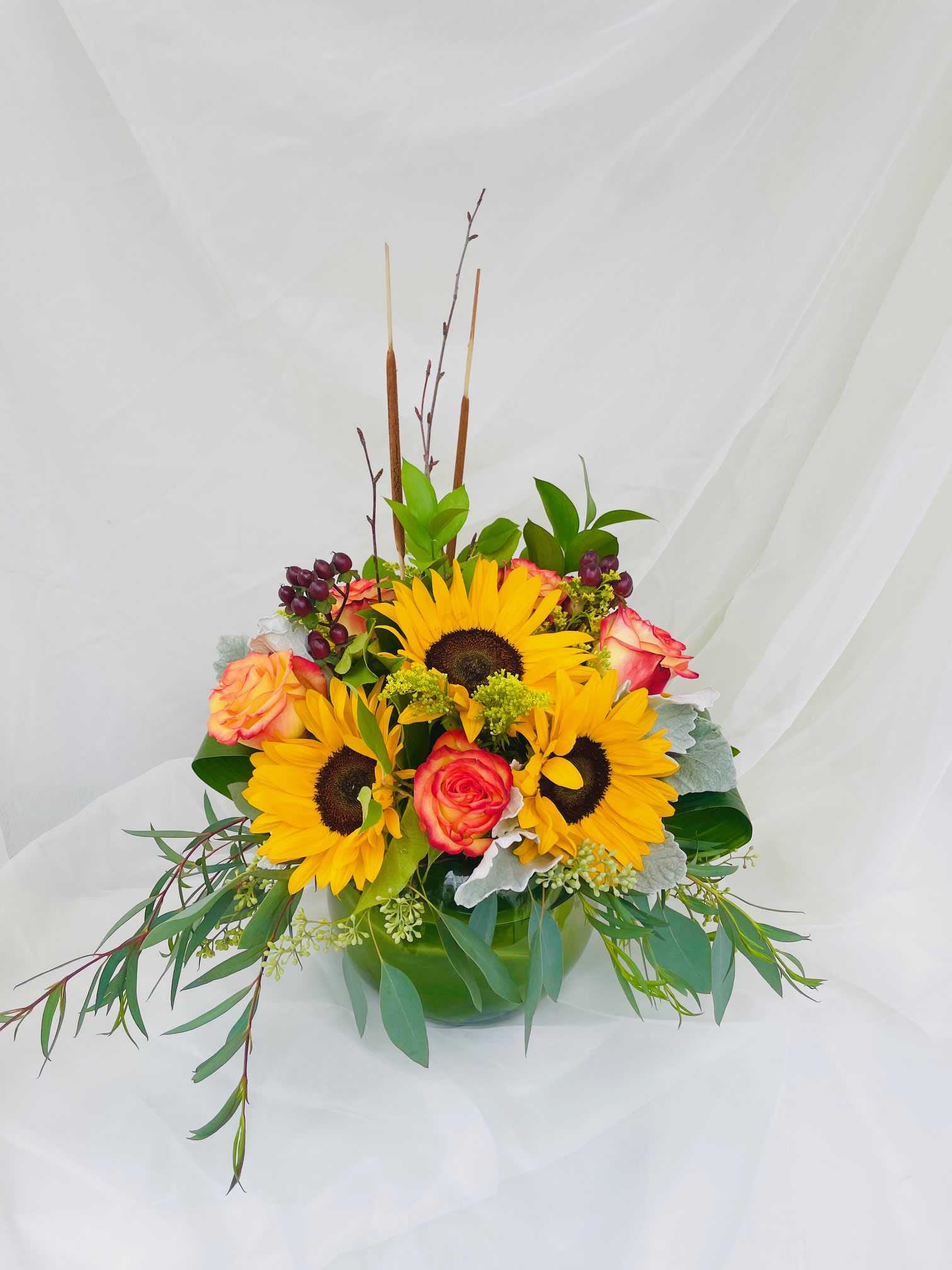 Fall-ing for you - An assortment of roses and sunflowers with touches of fall!