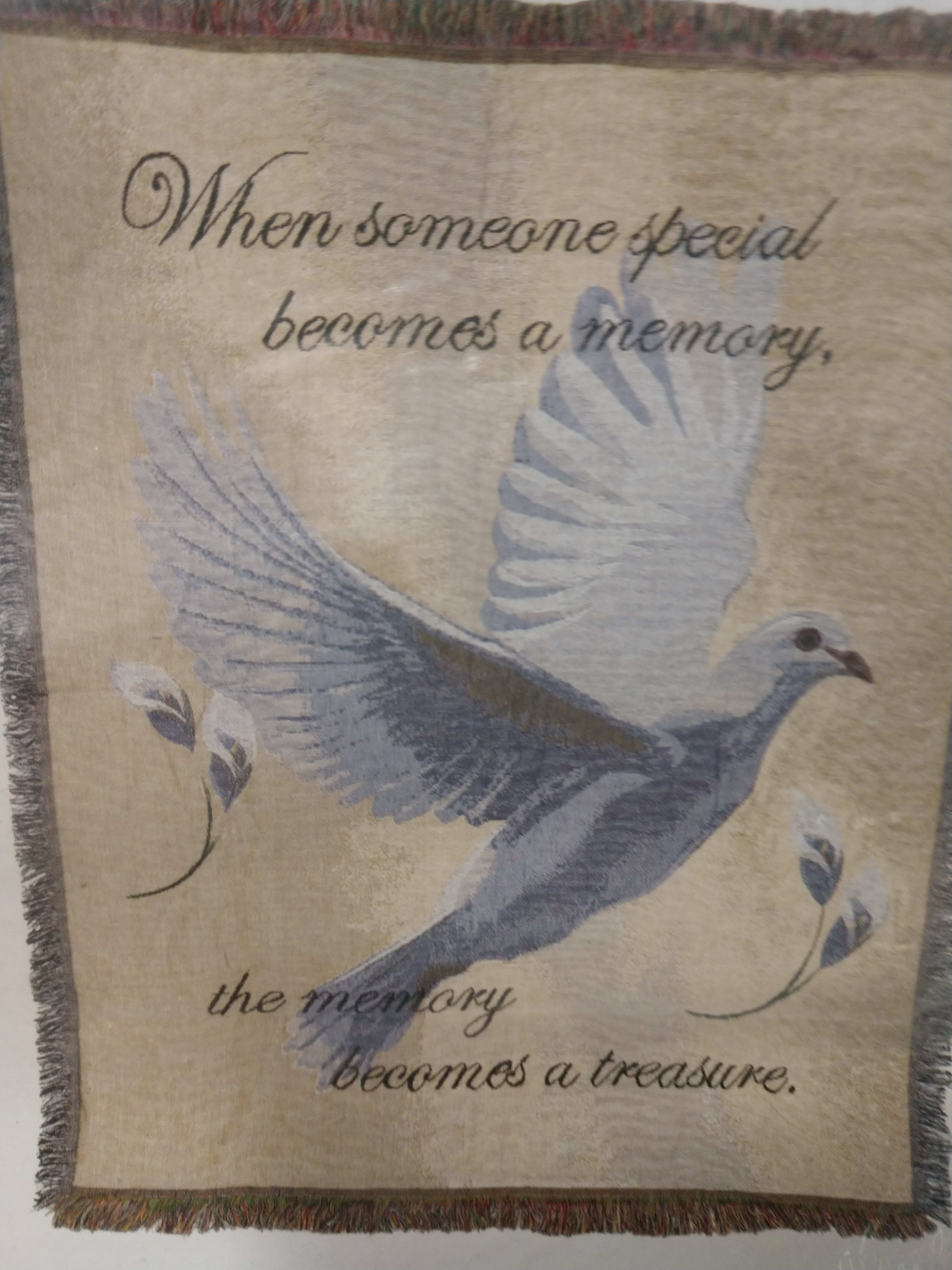 When someone special becomes a memory. - Throw Blanket When someone special becomes a memory. - Throw Blanket - When someone special becomes a memory the memory becomes a treasure, with a white dove. Delivered to the funeral home on an easel for display. Easel in not included in the price.