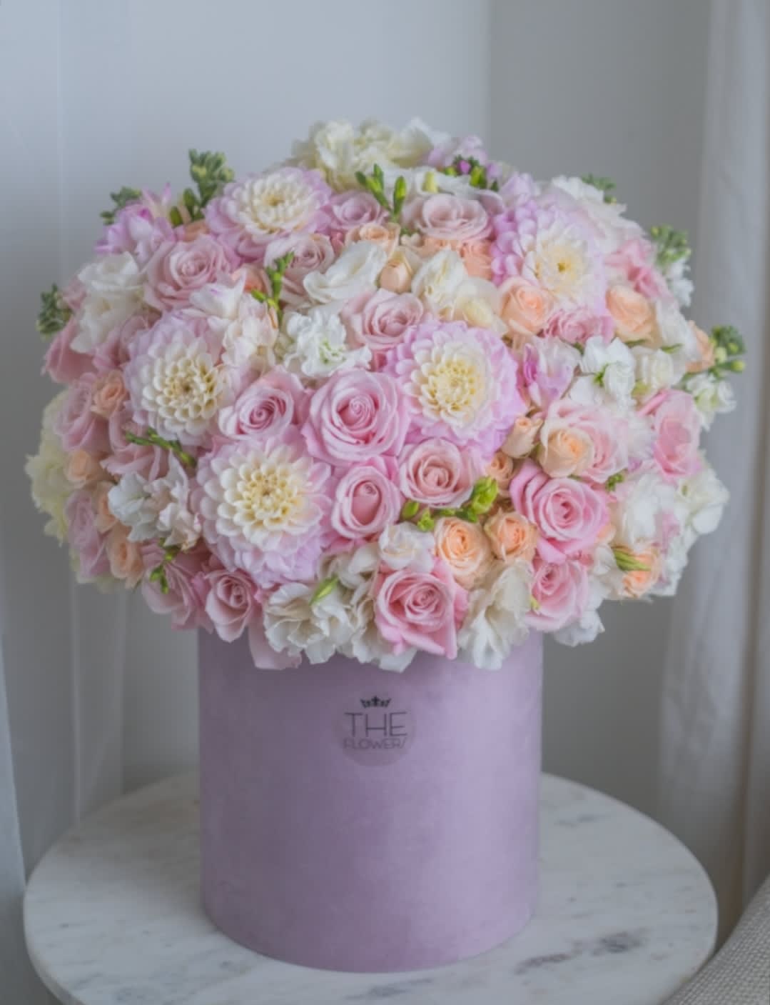 Young &amp; Beautiful - This arrangement in pastel pink shades is gentle, feminine, charming. Pink shades will enchant with the creamy strawberry shades of the palette. Looks delicious and beautiful. Arrangements in a hat box look elegant, they have long passed from the category of &quot;novelties&quot; into respected classics.