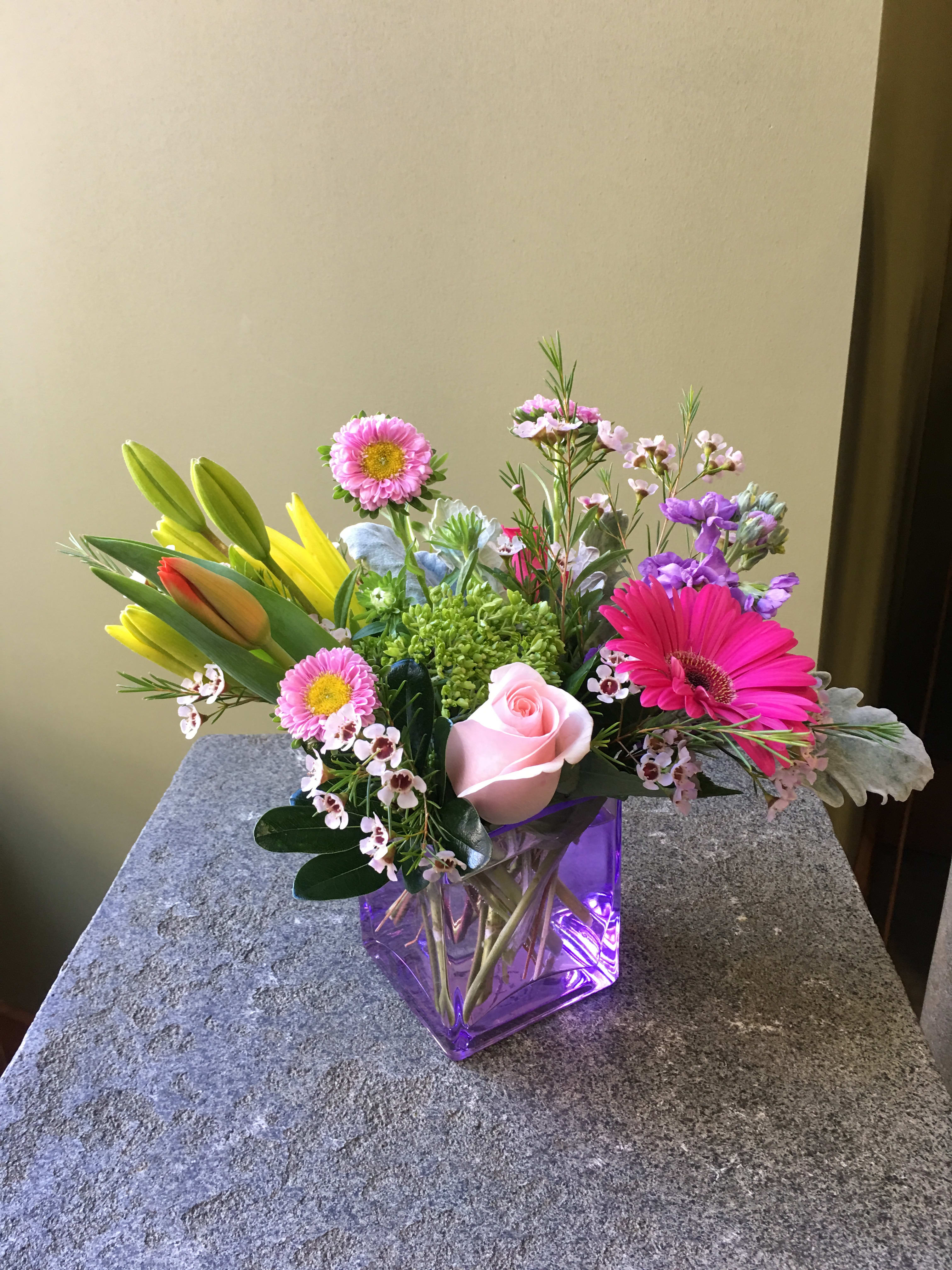 ELEGANCE CUBED - One of a kind creation - Beautiful one of a kind floral arrangement in a lovely cube vase. FLOWERS, STYLE AND VASE COLOR WILL VARY $50.00 SHOWN