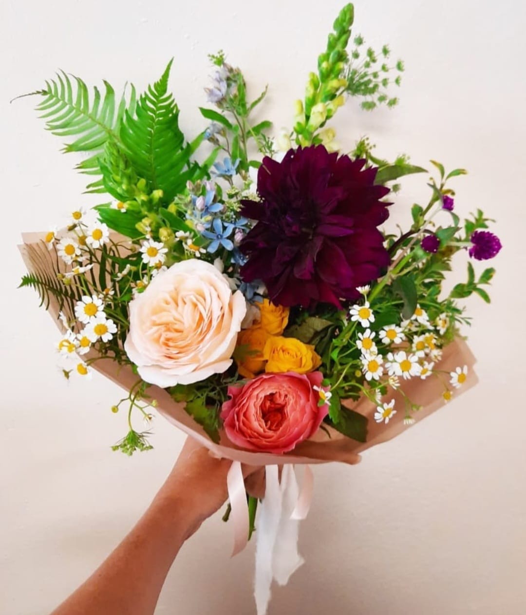 Fall designer choice wrapped bouquet - Designers choice arrangement using fresh seasonal hand picked market flowers. Flower type and color will vary depending on availability. Hand tied and wrapped in gift tissue THESE WRAPPED BOUQUETS ARRIVE OUT OF WATER.  FLOWERS ARE ALWAYS DELIVERED FRESH . PETAL AND PEACH IS NOT RESPONSIBLE FOR CONDITION OF FLOWERS ONCE RECIPIENT RECEIVES THE FLORAL.