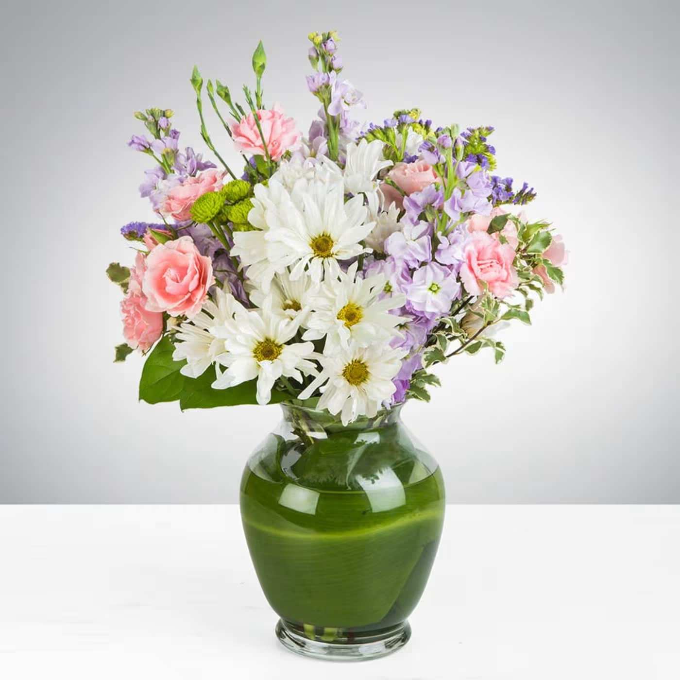 Blushing Fields - This spring bouquet is the perfect gift to freshen up any home or office. This arrangement contains Roses, Stock, Carnation and other seasonal blooms. This is a great gift for a Birthday, Mother's Day, Thank You, or Just Because. APPROXIMATE DIMENSIONS: 14.5 H&quot; X 11&quot; W