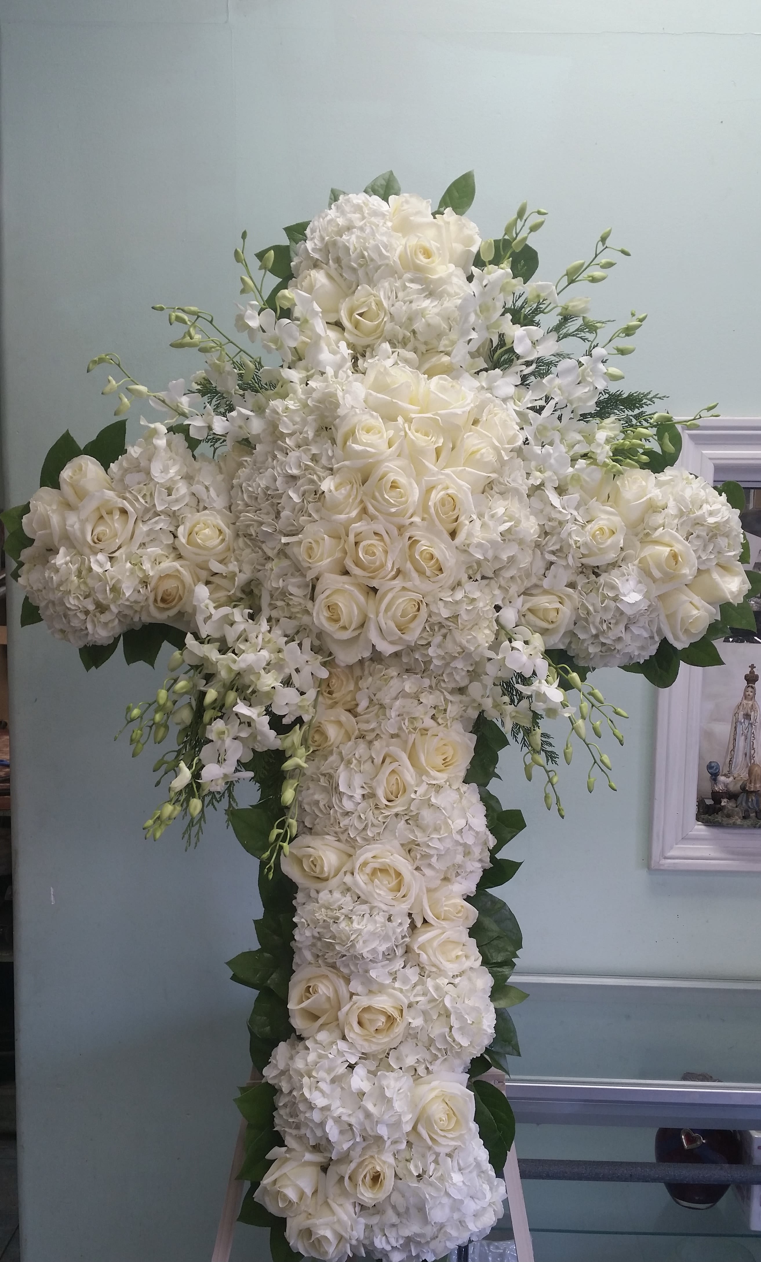 Comforting Splendor Cross  - Cross with white hydrangeas, roses, and orchids.