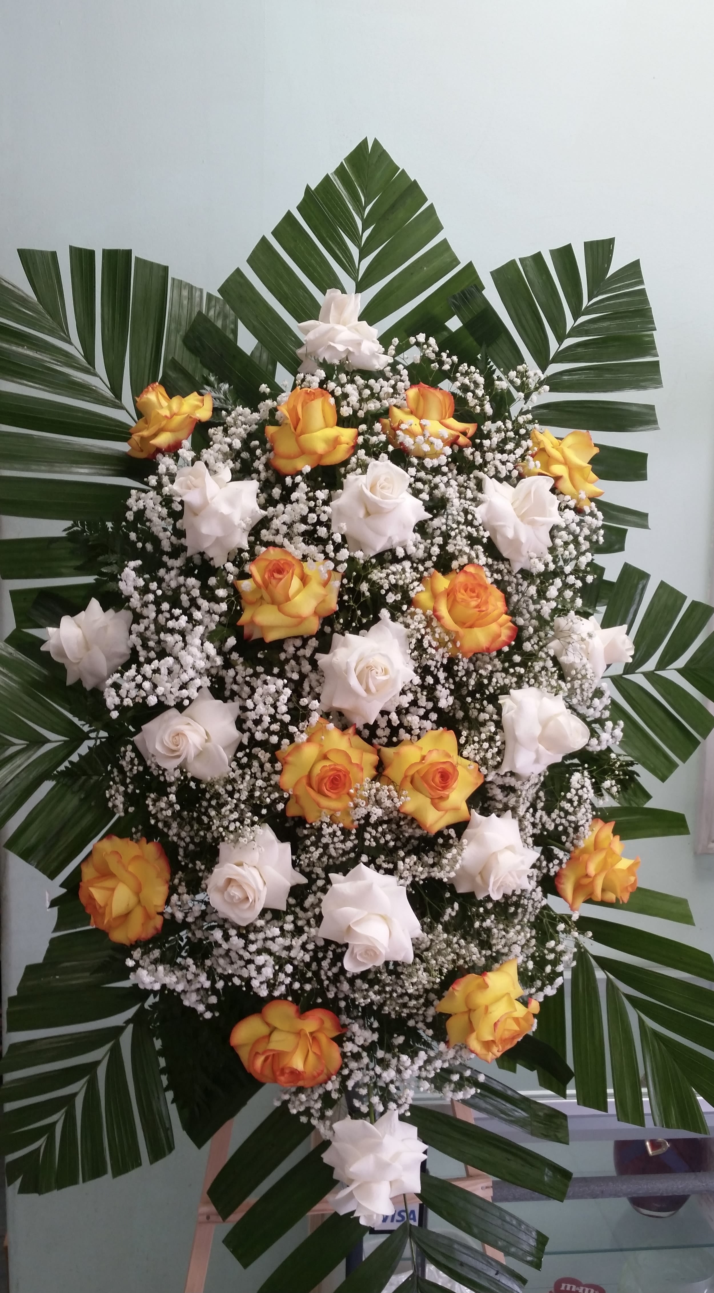 White &amp; Orange Rose Sympathy Spray  - Spray with white and orange roses.