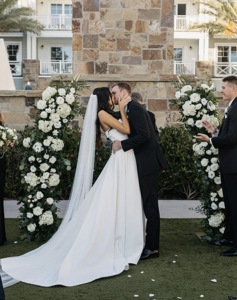 Gold Stand Half-Arch Small Rental - Transform your special day with the timeless elegance of our Gold Metal Half-Arch Stand! Available as a single half-arch stand or paired with a second for a unique asymmetrical arch, this versatile piece creates a stunning backdrop for weddings and events. The stand features a weighted base that can be securely staked into the ground, while the sturdy cross beams support lush floral installations, adding a personal touch to your celebration. Rent our Gold Stand Half-Arch for the perfect, picturesque frame for your &quot;I do&quot; moments!  The stand is for RENTAL for PICKUP only and will not be PURCHASED or SHIPPED. Select your EVENT DATE at CHECKOUT.   The standard rental period for the Gold Stand Half-Arch is one day. Our team will coordinate with you for specific pickup and return times to fit your schedule. For outdoor events, use the weighted base and stakes to secure it in place. Indoor events may require sandbags or other weights to ensure stability.  Please return the stand in its original condition at the agreed time to avoid any additional fees. Notify our team immediately if you encounter any issues during your rental period.  Dimensions: 28.25 x 1.0 x 77.0 Base Dimensions: 18&quot;x 18&quot;