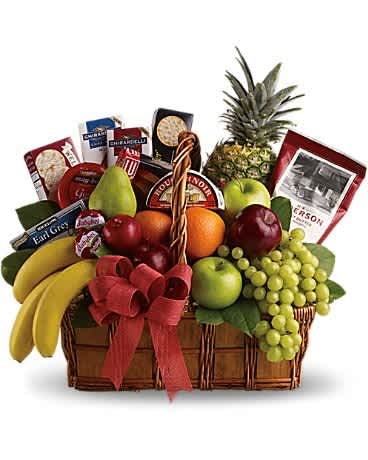 Bon Vivant Gourmet Basket - Life really can be a picnic for whoever is lucky enough to receive this tasteful basket. Overflowing with deliciousness, it's perfect for a party or a delightful day at the park! Red and green apples, bananas, pears, oranges, a pineapple, green grapes, pretzels, cheeses and crackers, gourmet chocolates and cookies and Earl Grey tea. This feast comes delivered in a handled wicker basket complete with red organza ribbon. Bon appÃ©tit!