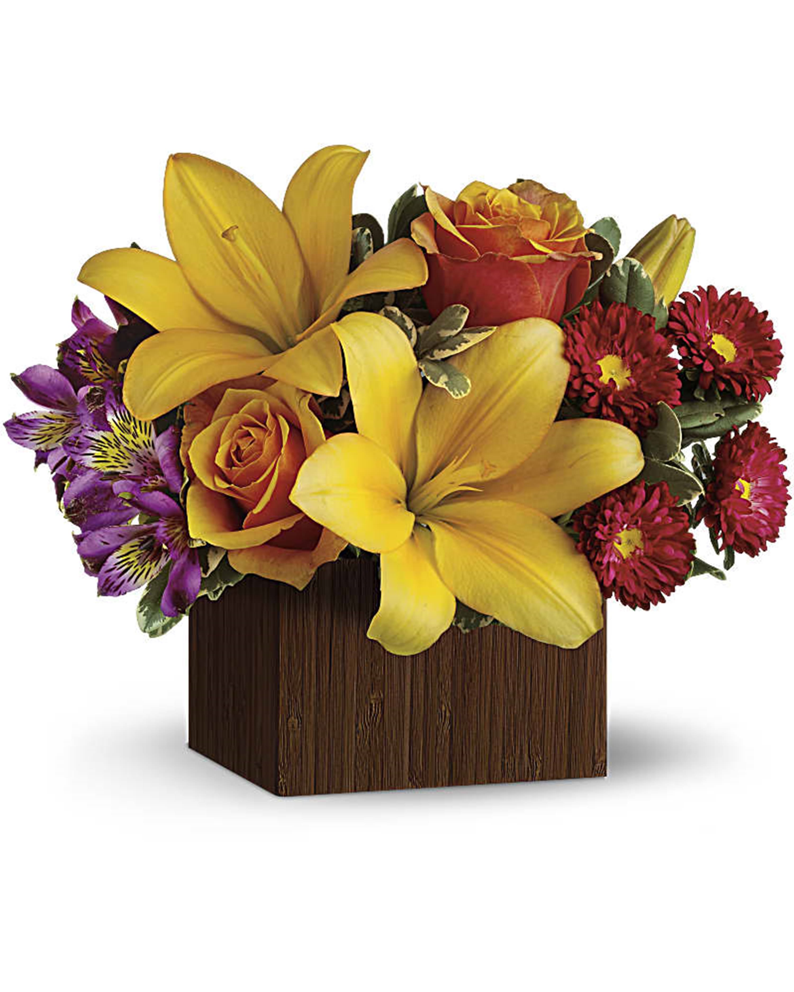 Full of Laughter - If laughter is the music of the heart, this arrangement is a symphony! Arranged in a sleek bamboo box for a touch of modern style, this deluxe arrangement lavishes that special someone with bright, cheerful blooms they won't soon forget.  DETAILS This deluxe bouquet bursts with yellow Asiatic lilies, purple alstroemeria, orange roses and red Matsumoto asters. Pretty pittosporum adds a touch of greenery.   WOODEN BOX INCLUDED Orientation: All-Around  Item #NF-361  FLORIST-TO-DOOR Same day flower delivery on most orders placed online by 12 pm or 10 am on weekends PST.  BLOOM DETAILS Roses Asiatic Lilies Matsumoto Asters Alstroemerias Greenery  The Standard Arrangement is approx. 10 1/2&quot; H x 13&quot; W. The Deluxe Arrangement is approx. 11 1/4&quot; H x 13 1/4&quot; W. The Premium Arrangement is approx. 12&quot; H x 14&quot; W.  How to place an order? 1. You can place an order directly on this secure website OR 2. You can call in your order by dialing: (323) 262 - 9238 OR 3. You can visit our store (appointment recommended 323.262.9238)  NINFA'S FLOWERS 2405 WHITTIER BLVD. LOS ANGELES, CA. 90023  ATTENTION: *Please note that on busy holidays, Valentine's Day, and Mother's Day, we cannot verify if the recipient received the flowers until the following day. You can verify delivery on the website after 10:00 pm, call 323.262.9238 the following day after 10:00 am, or contact the recipient directly. Thank you for your patience and understanding.