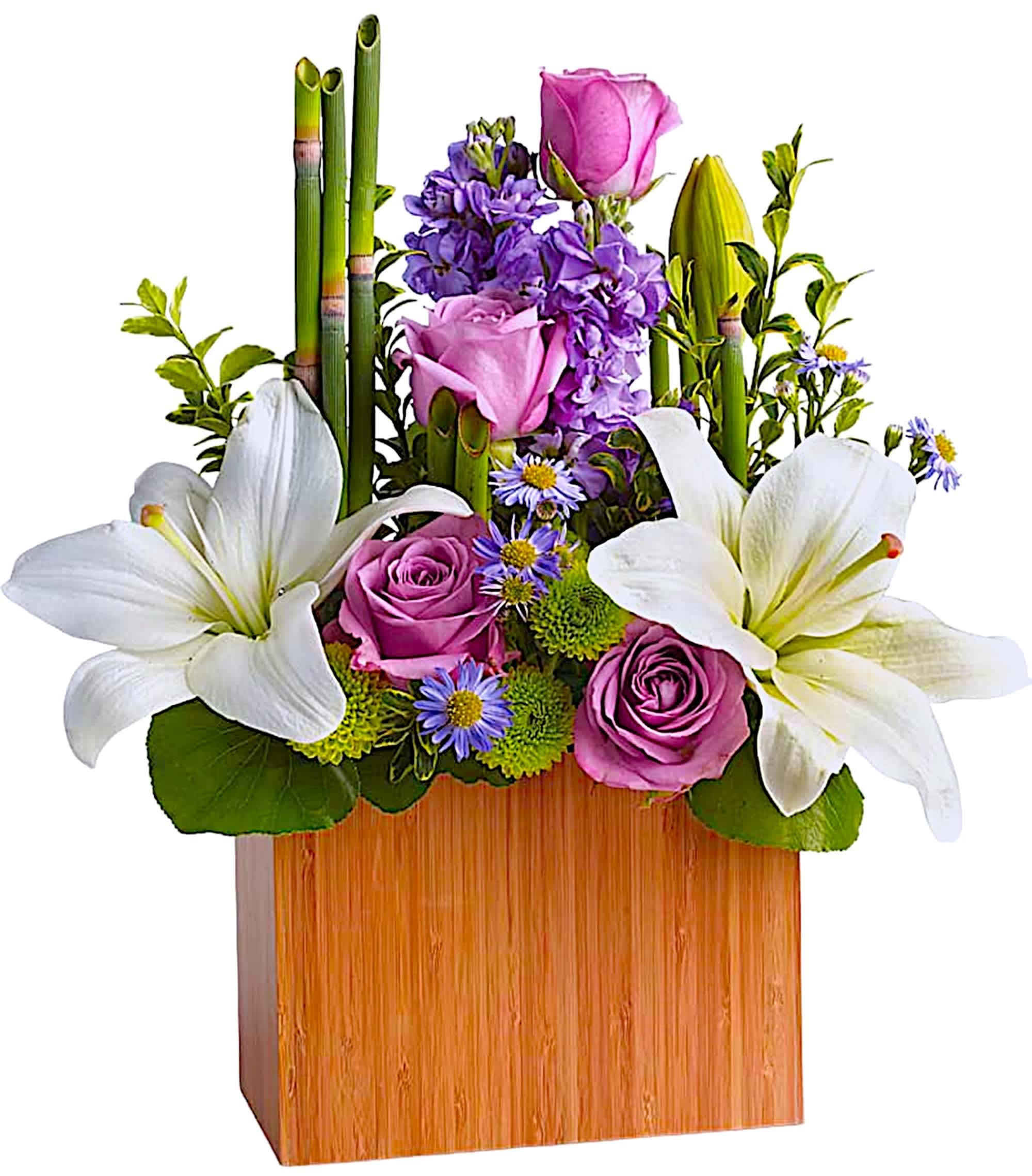 Kissed With Bliss - Send serenity. An artistic expression of love and peace, this luxurious lavender and white arrangement is presented in our stylish wooden rectangular vase. Accented with exotic greens, it brings natural serenity to any space.  DETAILS Includes lavender roses, white Asiatic lilies, lavender stock, monte cassino asters and green chrysanthemums, accented with fresh greenery.  WOODEN BOX INCLUDED Orientation: All-Around Item #NF-71  FLORIST-TO-DOOR Same day flower delivery on most orders placed online by 12 pm or 10 am on weekends PST.  BLOOM DETAILS Roses Asiatic Lilies Stock Button-Mums Monte-Casino Filler Greenery  The Standard Arrangement is approx. 15 1/2&quot; H x 14 1/2&quot; W. The Deluxe Arrangement is approx. 15 1/2&quot; H x 14 1/2&quot; W. The Premium Arrangement is approx. 15 1/2&quot; H x 15 1/2&quot; W.  How to place an order? 1. You can place an order directly on this secure website OR 2. You can call in your order by dialing: (323) 262 - 9238 OR 3. You can visit our store (appointment recommended 323.262.9238)  NINFA'S FLOWERS 2405 WHITTIER BLVD. LOS ANGELES, CA. 90023  ATTENTION: *Please note that on busy holidays, Valentine's Day, and Mother's Day, we cannot verify if the recipient received the flowers until the following day. You can verify delivery on the website after 10:00 pm, call 323.262.9238 the following day after 10:00 am, or contact the recipient directly. Thank you for your patience and understanding.