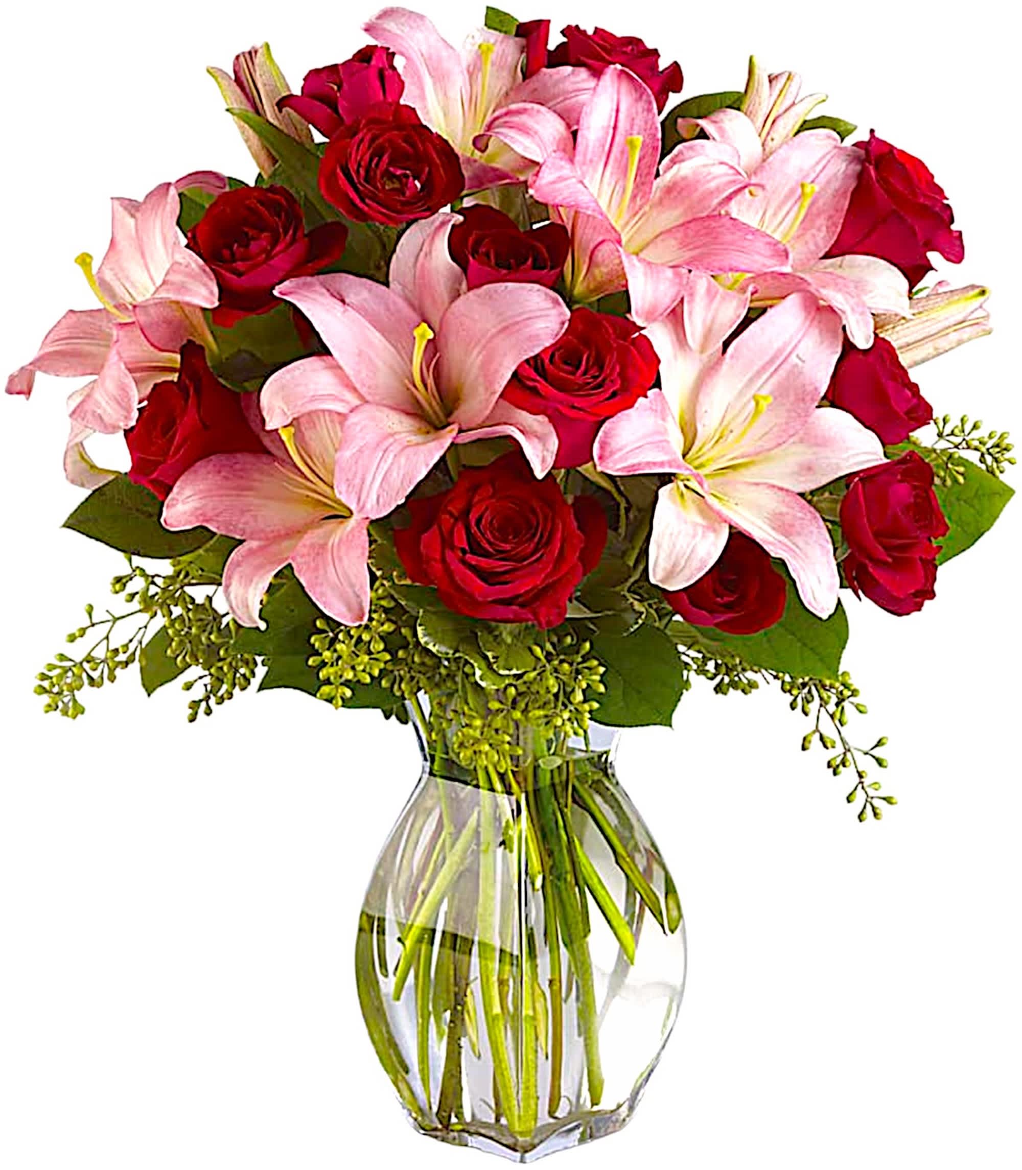 Lavish Love - Be still my heart! What an impression you'll make when you send her this gorgeous array of red roses and fragrant pink lilies in a classic clear glass vase.  DETAILS The spectacular arrangement includes red roses, red spray roses and light pink Asiatic lilies accented with assorted greenery.  VASE INCLUDED Orientation: All-Around Item #NF-393  FLORIST-TO-DOOR Same day flower delivery on most orders placed online by 12 pm or 10 am on weekends PST.  BLOOM DETAILS Roses Spray Roses Asiatic Lilies Greenery  The Standard Arrangement is approx. 20&quot; H x 17&quot; W. The Deluxe Arrangement is approx. 21&quot; H x 17 1/2&quot; W. The Premium Arrangement is approx. 22&quot; H x 18&quot; W.  How to place an order? 1. You can place an order directly on this secure website OR 2. You can call in your order by dialing: (323) 262 - 9238 OR 3. You can visit our store (appointment recommended 323.262.9238)  NINFA'S FLOWERS 2405 WHITTIER BLVD. LOS ANGELES, CA. 90023  ATTENTION: *Please note that on busy holidays, Valentine's Day, and Mother's Day, we cannot verify if the recipient received the flowers until the following day. You can verify delivery on the website after 10:00 pm, call 323.262.9238 the following day after 10:00 am, or contact the recipient directly. Thank you for your patience and understanding.