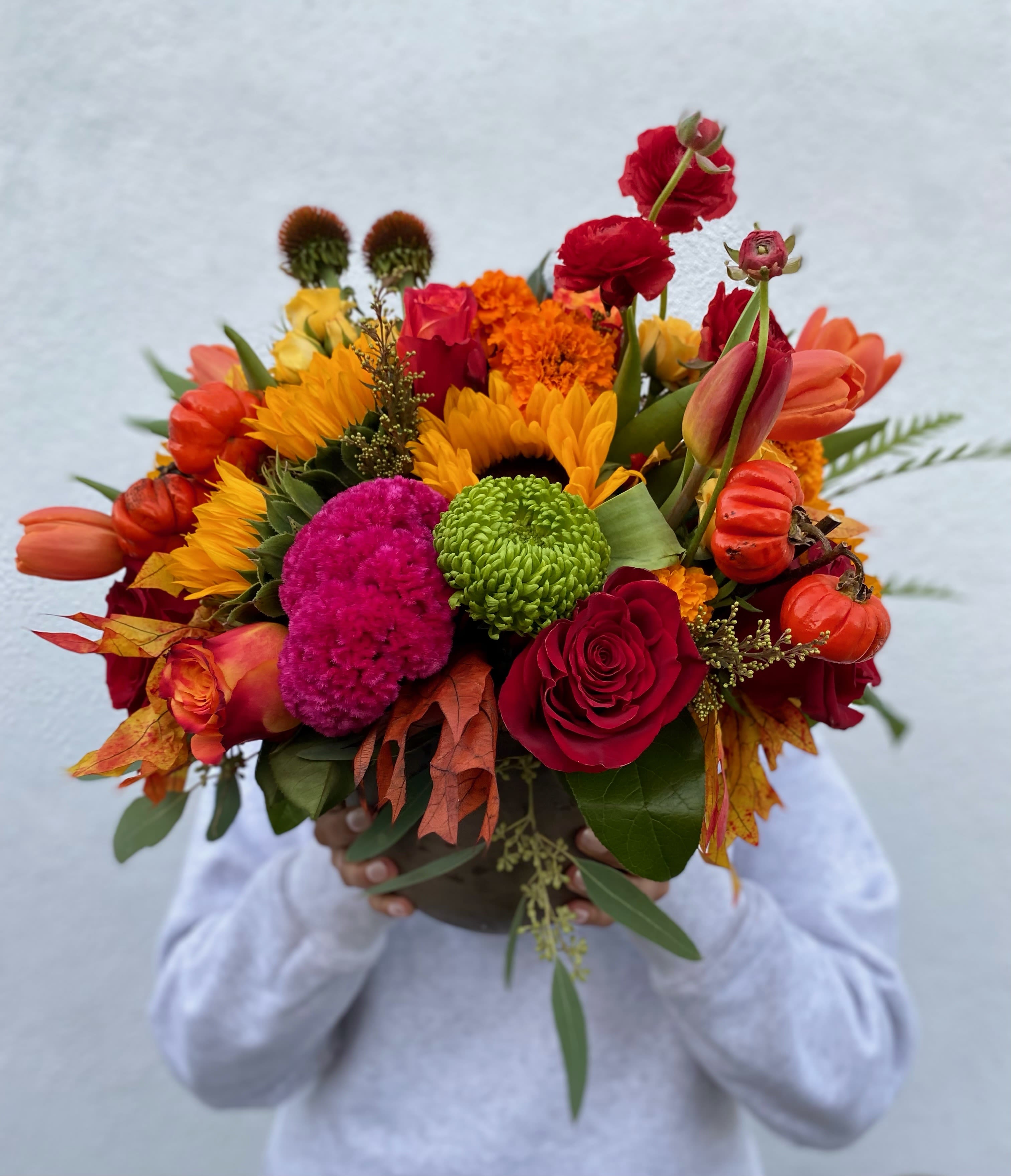 Cider Season  - This stunning arrangement includes a variety of fall flowers, marigolds, sunflowers, coxcomb flowers, tulips etc all hand arranged in vase.