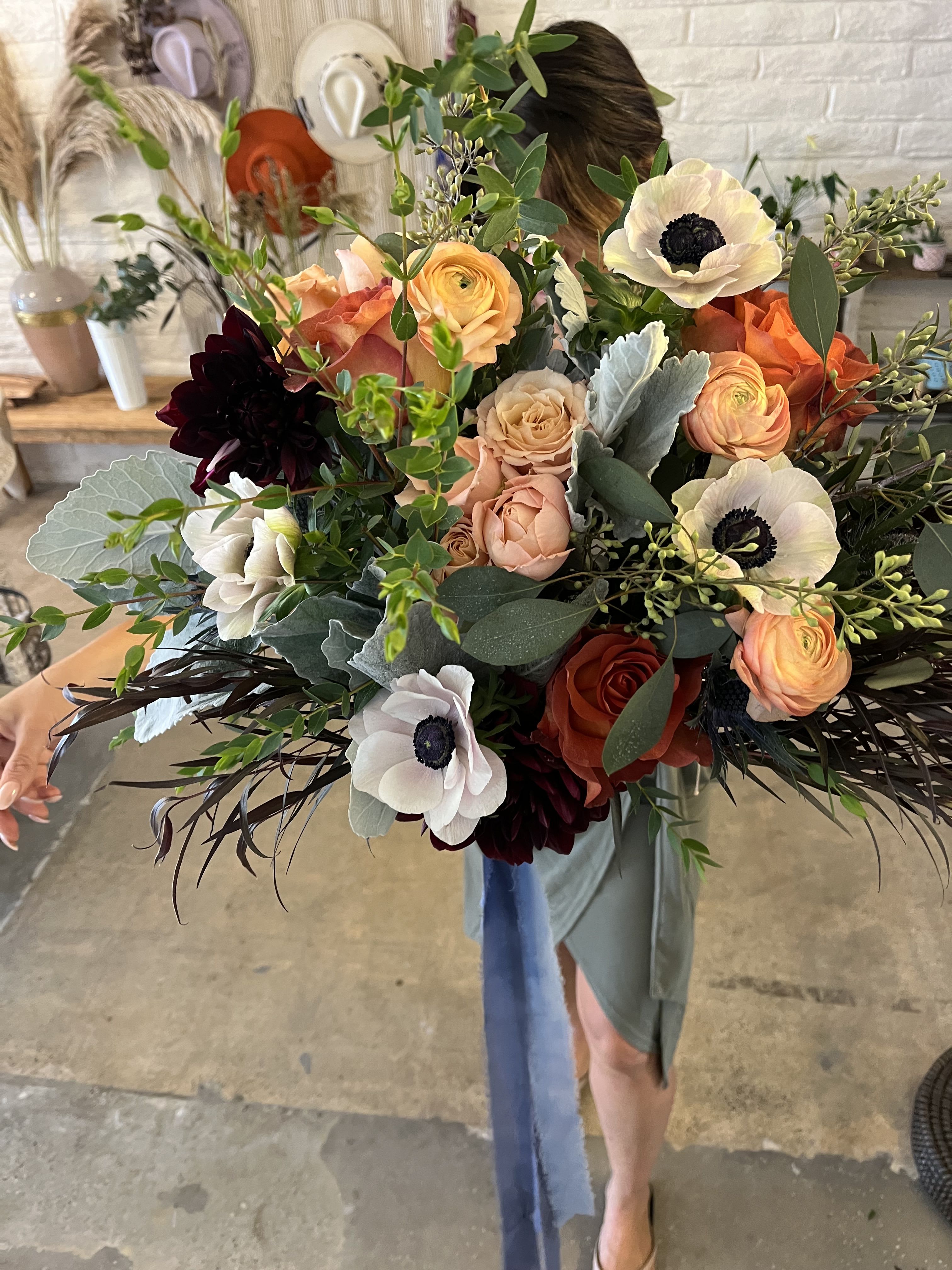 Autumn Designer Choice Autumn Designer Choice - This stunning Autumn Bouquet is a designer's choice creation, featuring a vibrant array of seasonal blooms in rich fall colors. Expect deep oranges, burgundies, and warm yellows, complemented by textured foliage and natural elements like pinecones or berries. Each bouquet is uniquely crafted to capture the essence of autumn, evoking the cozy charm of the season. Perfect for any occasion, it brings the beauty of fall indoors.