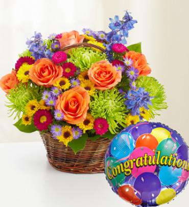 Beautiful Basket to Say Congratulations Beautiful Basket to Say Congratulations - Congratulate them on a rewarding achievement with this gorgeous hand-designed arrangement in a handled willow basket. Overflowing with fresh roses, delphinium, mums, poms and more and paired with a festive Mylar balloon, it's a beautiful surprise that recognizes them with a smile. (Vase/Basket style may vary) Item # 91579