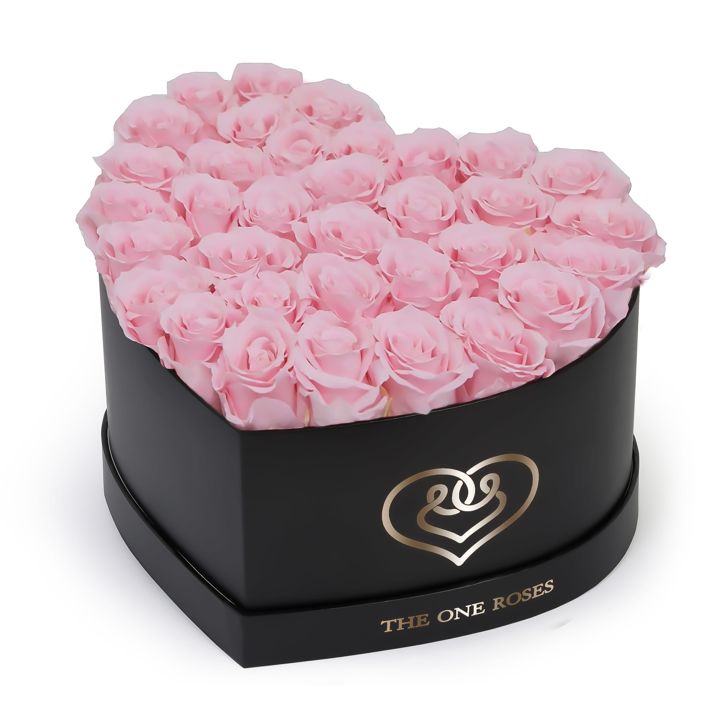Candy Pink Roses | Black "Love" Box Candy Pink Roses | Black "Love" Box - The "heart box collection" consists of unique, real preserved roses handcrafted, soft, and elegant heart box with a top. Luxury arrangement of about 31 stems of the one long lasting (med size) real preserved roses.  Durability: approx. 1-3 years.  Our roses, which are carefully sourced from the highest quality gardens in Ecuador, are made to represent the eternal yet ephemeral nature of Love itself. Our Roses are specially customized with essential oils to increase the fragrance.  Product Care: DO NOT Water the roses! AVOID direct exposure to sunlight. Keep the arrangement in a room-temperature environment. If dust collects after a few months, remove it lightly using a duster. DO NOT place anything onto the roses as they can crush and damage the roses. DO NOT remove the roses from the box; they are secure and happy there. DO NOT allow roses to have direct contact with light colored fabric or surfaces, as staining may occur. The lid is meant to stay on the side or bottom of the box. Be mindful when carrying the arrangement: it's a very delicate product!