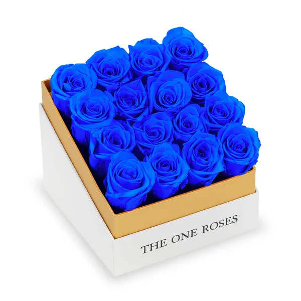 Coffee Table White Square Box - Sapphire Blue Roses Coffee Table White Square Box - Sapphire Blue Roses - The "Luxury Square Coffee Table Collection“  Following in the spirit of our The One Roses style, the "Luxury Square Coffee Table Collection“ consists of unique, real preserved roses in classic handcrafted luxury soft touch box with a top.  16 stems of The One long lasting (med size) preserved roses.  THE ONE ROSES - Feelings Forever