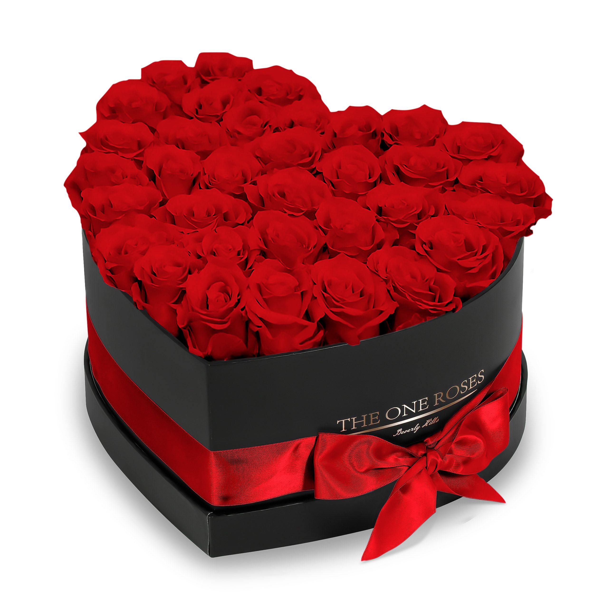 Crimson Red Roses | Black "Love" Box with Red Ribbon Crimson Red Roses | Black "Love" Box with Red Ribbon - The "heart box collection" consists of unique, real preserved roses handcrafted, soft, and elegant heart box with a top. Luxury arrangement of about 31 stems of the one long lasting (med size) real preserved roses.  Durability: approx. 1-3 years.  Our roses, which are carefully sourced from the highest quality gardens in Ecuador, are made to represent the eternal yet ephemeral nature of Love itself. Our Roses are specially customized with essential oils to increase the fragrance.  Product Care: DO NOT Water the roses! AVOID direct exposure to sunlight. Keep the arrangement in a room-temperature environment. If dust collects after a few months, remove it lightly using a duster. DO NOT place anything onto the roses as they can crush and damage the roses. DO NOT remove the roses from the box; they are secure and happy there. DO NOT allow roses to have direct contact with light colored fabric or surfaces, as staining may occur. The lid is meant to stay on the side or bottom of the box. Be mindful when carrying the arrangement: it's a very delicate product!