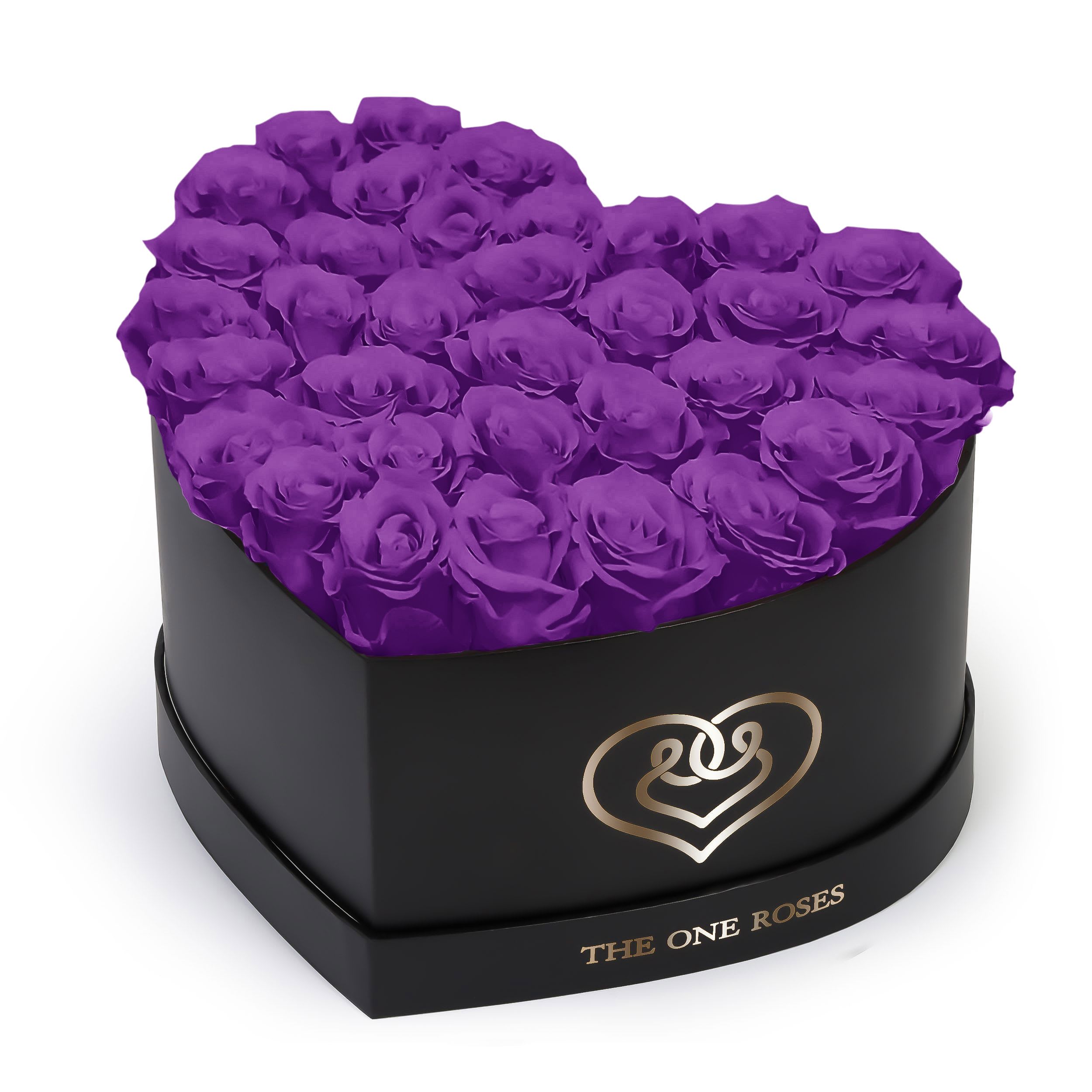 Purple Roses | Black "Love" Box Purple Roses | Black "Love" Box - The "heart box collection" consists of unique, real preserved roses handcrafted, soft, and elegant heart box with a top. Luxury arrangement of about 31 stems of the one long lasting (med size) real preserved roses.  Durability: approx. 1-3 years.  Our roses, which are carefully sourced from the highest quality gardens in Ecuador, are made to represent the eternal yet ephemeral nature of Love itself. Our Roses are specially customized with essential oils to increase the fragrance.  Product Care: DO NOT Water the roses! AVOID direct exposure to sunlight. Keep the arrangement in a room-temperature environment. If dust collects after a few months, remove it lightly using a duster. DO NOT place anything onto the roses as they can crush and damage the roses. DO NOT remove the roses from the box; they are secure and happy there. DO NOT allow roses to have direct contact with light colored fabric or surfaces, as staining may occur. The lid is meant to stay on the side or bottom of the box. Be mindful when carrying the arrangement: it's a very delicate product!