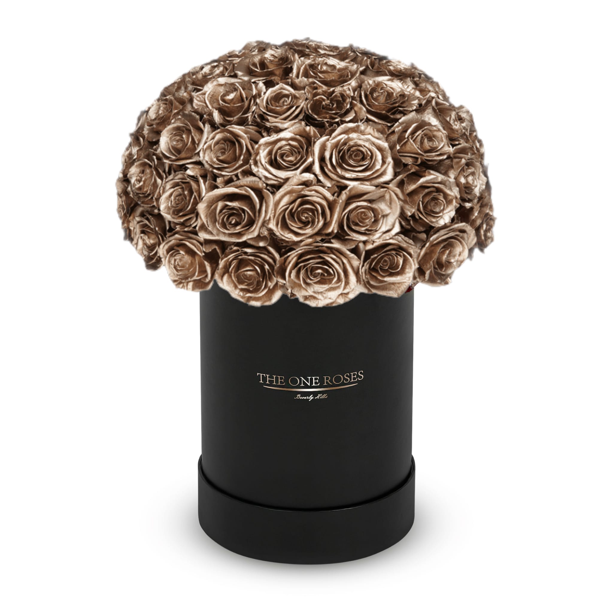 Round Dome | Basic Black Box Metallic Gold Round Dome | Basic Black Box Metallic Gold - The “Runway Round Collection”. consists of unique, real preserved roses in basic round handcrafted luxury soft touch box with a top. About 40-50 stems of The One long lasting (med size) preserved roses.    Durability: approx. 1-3 years.  Our roses, which are carefully sourced from the highest quality gardens in Ecuador, are made to represent the eternal yet ephemeral nature of Love itself. Our Roses are specially customized with essential oils to increase the fragrance.  Product Care: DO NOT Water the roses! AVOID direct exposure to sunlight. Keep the arrangement in a room-temperature environment. If dust collects after a few months, remove it lightly using a duster. DO NOT place anything onto the roses as they can crush and damage the roses. DO NOT remove the roses from the box; they are secure and happy there. DO NOT allow roses to have direct contact with light colored fabric or surfaces, as staining may occur. The lid is meant to stay on the side or bottom of the box. Be mindful when carrying the arrangement: it's a very delicate product!