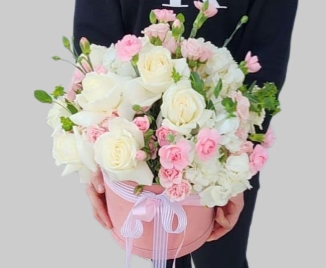 Blush pink  - The stunningly elegant and classic bouquet will be sure to take your breath away- pictures do not do it justice! Featuring white hydrangea, white and pink carnation, garden roses.
