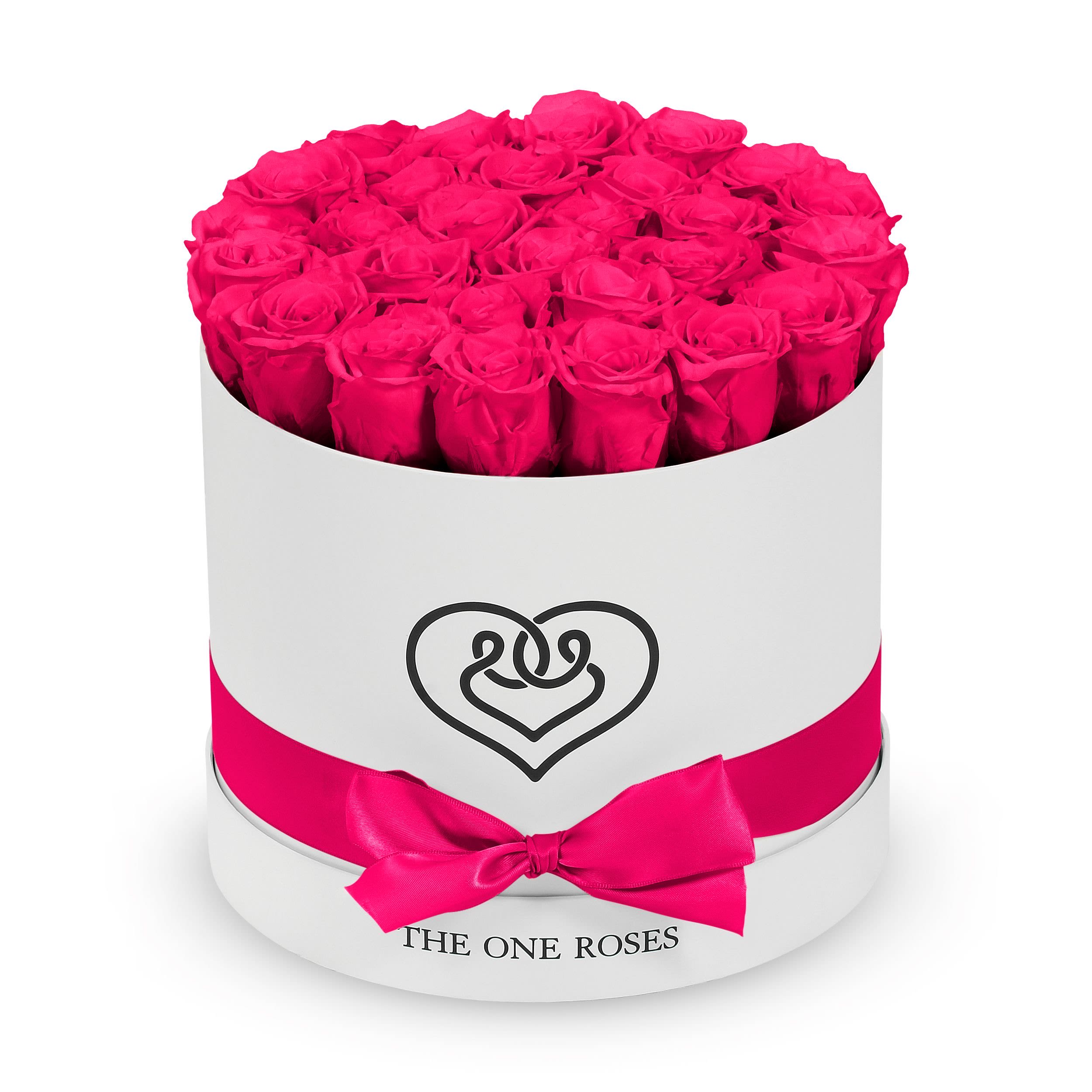 Round Flat | Classic White Box Hot Pink Round Flat | Classic White Box Hot Pink - The "runway round collection" consists of unique, real preserved roses in classic round handcrafted luxury soft touch box with a top. About 25-30 stems of the one long lasting (med size) preserved roses.  Durability: approx. 1-3 years.  Our roses, which are carefully sourced from the highest quality gardens in Ecuador, are made to represent the eternal yet ephemeral nature of Love itself. Our Roses are specially customized with essential oils to increase the fragrance.  Product Care: DO NOT Water the roses! AVOID direct exposure to sunlight. Keep the arrangement in a room-temperature environment. If dust collects after a few months, remove it lightly using a duster. DO NOT place anything onto the roses as they can crush and damage the roses. DO NOT remove the roses from the box; they are secure and happy there. DO NOT allow roses to have direct contact with light colored fabric or surfaces, as staining may occur. The lid is meant to stay on the side or bottom of the box. Be mindful when carrying the arrangement: it's a very delicate product!