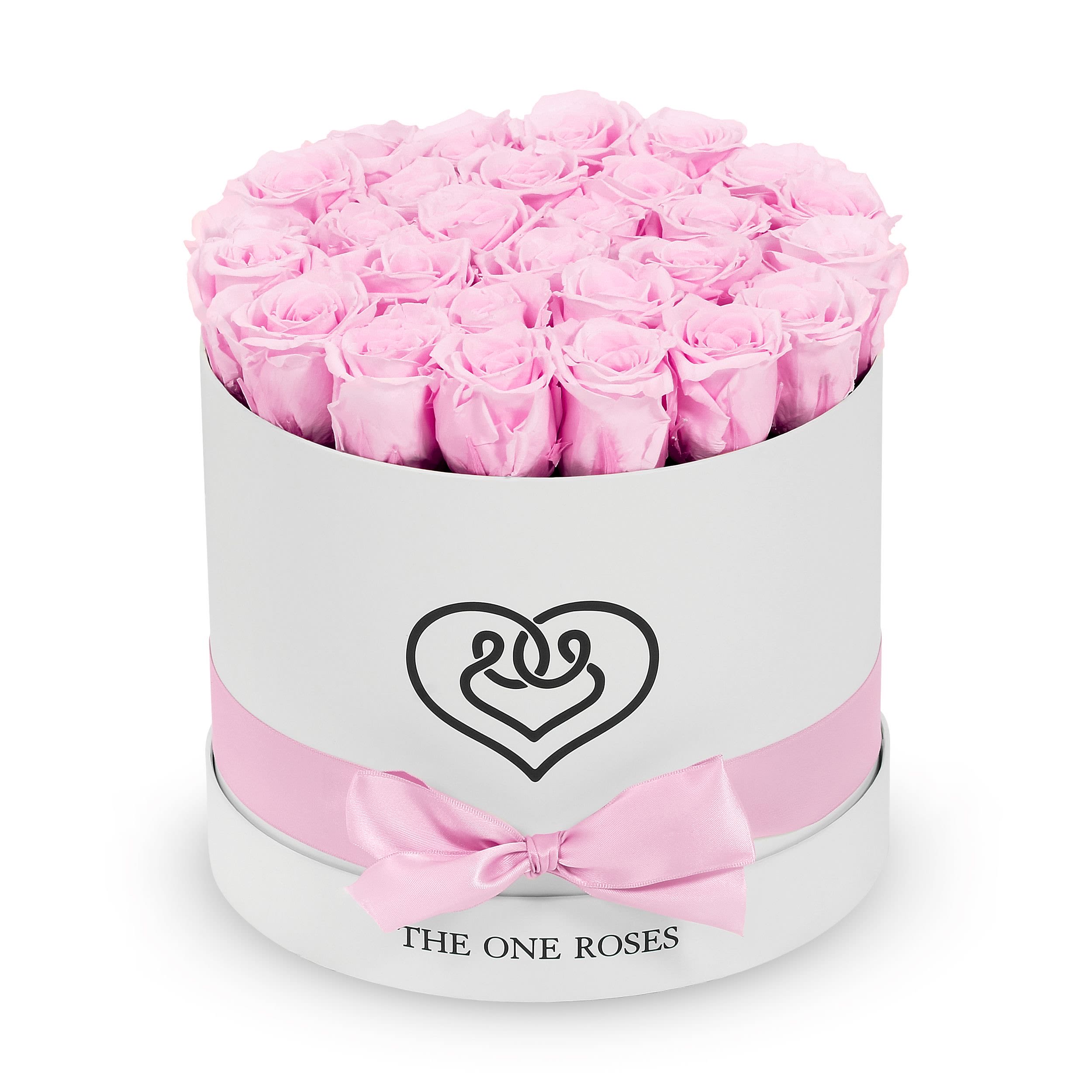 Round Flat | Classic White Box Lilac Round Flat | Classic White Box Lilac - The "runway round collection" consists of unique, real preserved roses in classic round handcrafted luxury soft touch box with a top. About 25-30 stems of the one long lasting (med size) preserved roses.  Durability: approx. 1-3 years.  Our roses, which are carefully sourced from the highest quality gardens in Ecuador, are made to represent the eternal yet ephemeral nature of Love itself. Our Roses are specially customized with essential oils to increase the fragrance.  Product Care: DO NOT Water the roses! AVOID direct exposure to sunlight. Keep the arrangement in a room-temperature environment. If dust collects after a few months, remove it lightly using a duster. DO NOT place anything onto the roses as they can crush and damage the roses. DO NOT remove the roses from the box; they are secure and happy there. DO NOT allow roses to have direct contact with light colored fabric or surfaces, as staining may occur. The lid is meant to stay on the side or bottom of the box. Be mindful when carrying the arrangement: it's a very delicate product!