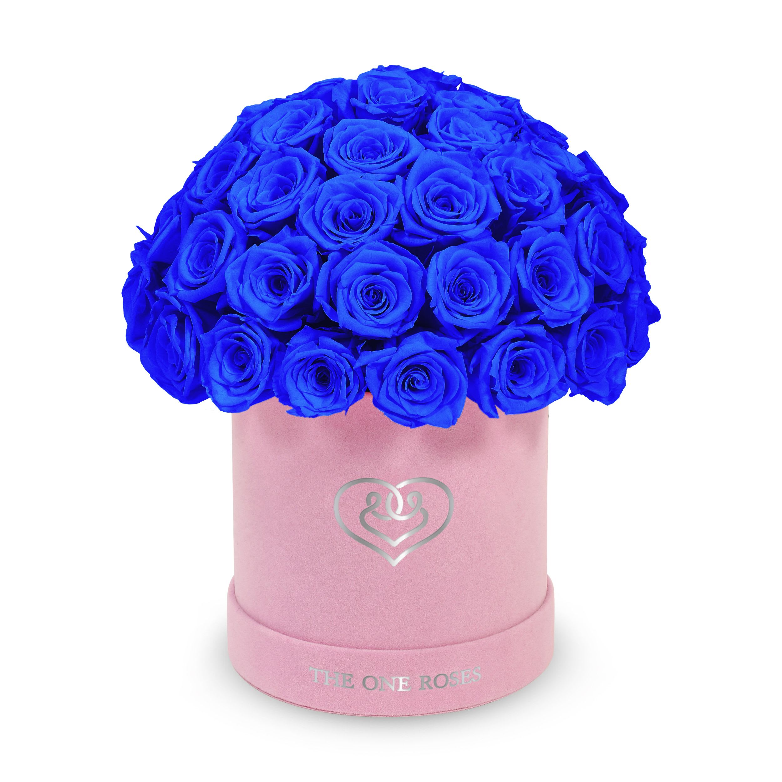 Suede Dome | Basic Pink Box Sapphire Blue Suede Dome | Basic Pink Box Sapphire Blue - The One Roses “Suede Collection“ consists of unique, real preserved roses in basic round handcrafted luxury black suede box with a top.  With about 50 stems of The One long lasting (med size) real preserved roses.  Durability: approx. 1-3 years.  Product Dimension: 6″× 6″ / ABOUT 50 ROSES  Our roses, which are carefully sourced from the highest quality gardens in Ecuador, are made to represent the eternal yet ephemeral nature of Love itself. Our Roses are specially customized with essential oils to increase the fragrance.  Product Care: DO NOT Water the roses! AVOID direct exposure to sunlight. Keep the arrangement in a room-temperature environment. If dust collects after a few months, remove it lightly using a duster. DO NOT place anything onto the roses as they can crush and damage the roses. DO NOT remove the roses from the box; they are secure and happy there. DO NOT allow roses to have direct contact with light colored fabric or surfaces, as staining may occur. The lid is meant to stay on the side or bottom of the box. Be mindful when carrying the arrangement: it's a very delicate product!