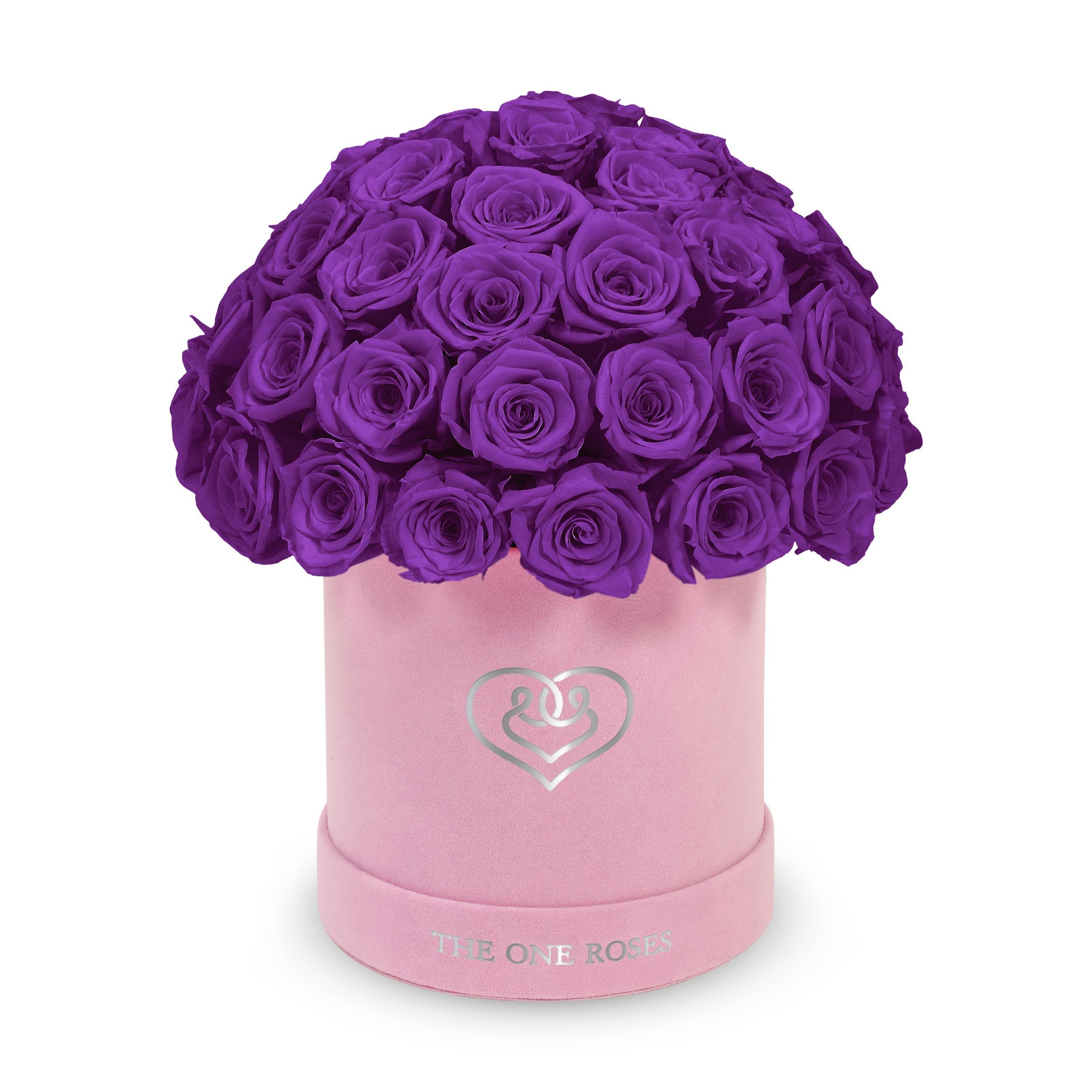 Suede Dome | Basic Pink Box Purple Suede Dome | Basic Pink Box Purple - The One Roses “Suede Collection“ consists of unique, real preserved roses in basic round handcrafted luxury black suede box with a top.  With about 50 stems of The One long lasting (med size) real preserved roses.  Durability: approx. 1-3 years.  Product Dimension: 6″× 6″ / ABOUT 50 ROSES  Our roses, which are carefully sourced from the highest quality gardens in Ecuador, are made to represent the eternal yet ephemeral nature of Love itself. Our Roses are specially customized with essential oils to increase the fragrance.  Product Care: DO NOT Water the roses! AVOID direct exposure to sunlight. Keep the arrangement in a room-temperature environment. If dust collects after a few months, remove it lightly using a duster. DO NOT place anything onto the roses as they can crush and damage the roses. DO NOT remove the roses from the box; they are secure and happy there. DO NOT allow roses to have direct contact with light colored fabric or surfaces, as staining may occur. The lid is meant to stay on the side or bottom of the box. Be mindful when carrying the arrangement: it's a very delicate product!