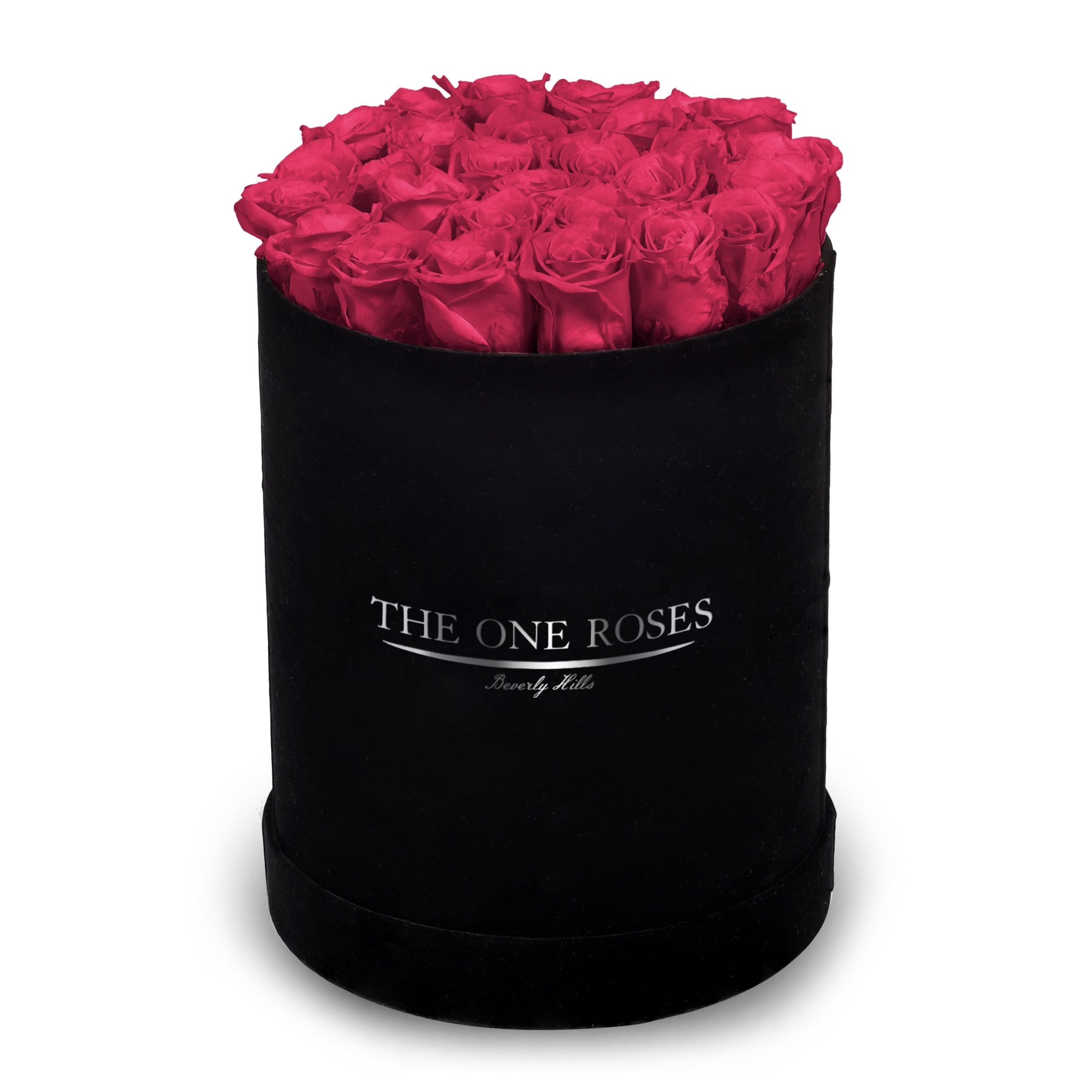 Suede Flat | Premium Black Box Hot Pink Suede Flat | Premium Black Box Hot Pink - The One Roses “Suede Collection“ consists of unique, real preserved roses in premium round handcrafted luxury black suede box with a top.  About 23-30 stems of The One long lasting (med size) real preserved roses.  THE ONE ROSES - Declaration of Love   Durability: approx. 1-3 years.