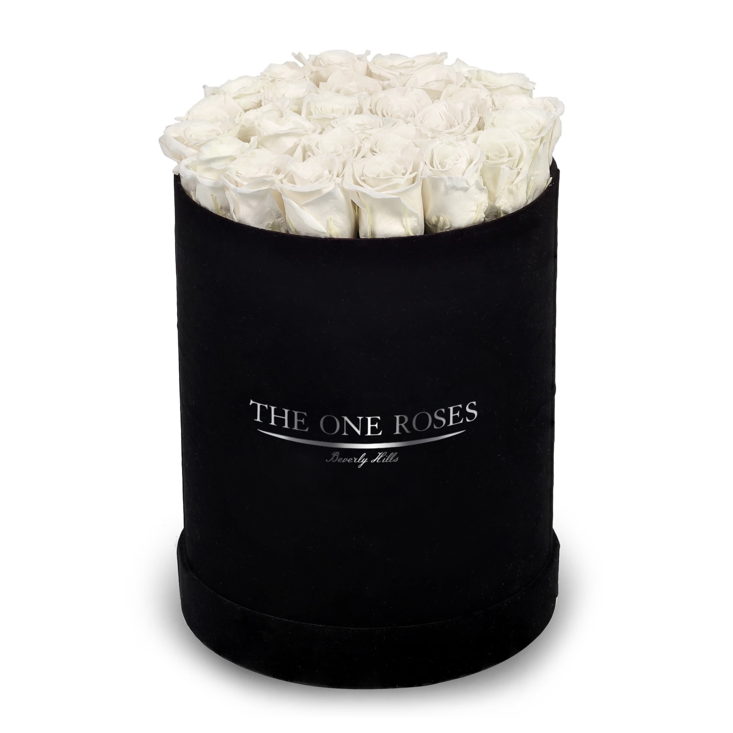 Suede Flat | Premium Black Box Pearl White Suede Flat | Premium Black Box Pearl White - The One Roses “Suede Collection“ consists of unique, real preserved roses in premium round handcrafted luxury black suede box with a top.  About 23-30 stems of The One long lasting (med size) real preserved roses.  THE ONE ROSES - Declaration of Love   Durability: approx. 1-3 years.