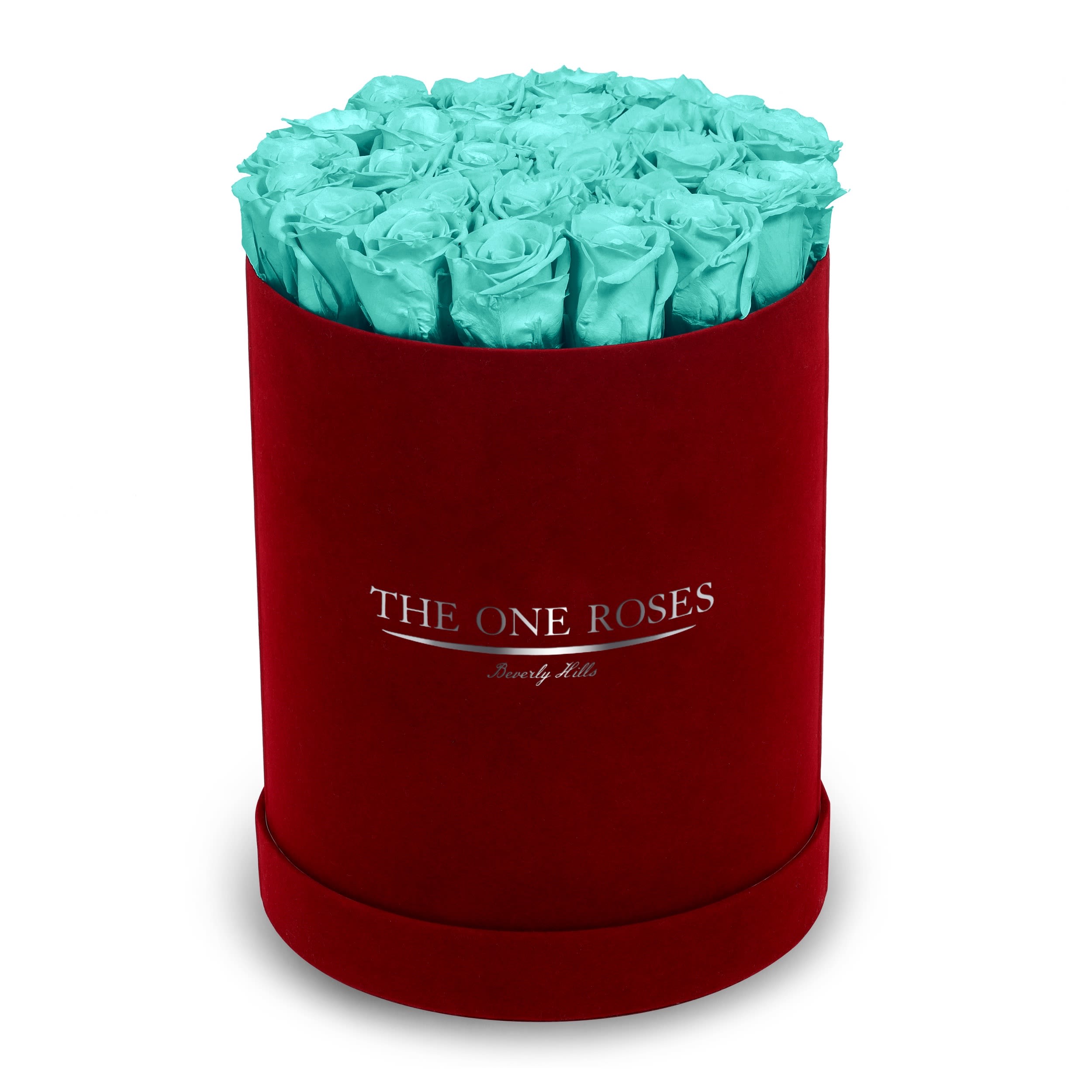 Suede Flat | Premium Burgundy Box Teal Blue Suede Flat | Premium Burgundy Box Teal Blue - The One Roses “Suede Collection“ consists of unique, real preserved roses in premium round handcrafted luxury burgundy suede box with a top.  About 23-30 stems of The One long lasting (med size) real preserved roses.  THE ONE ROSES - Declaration of Love   Durability: approx. 1-3 years.