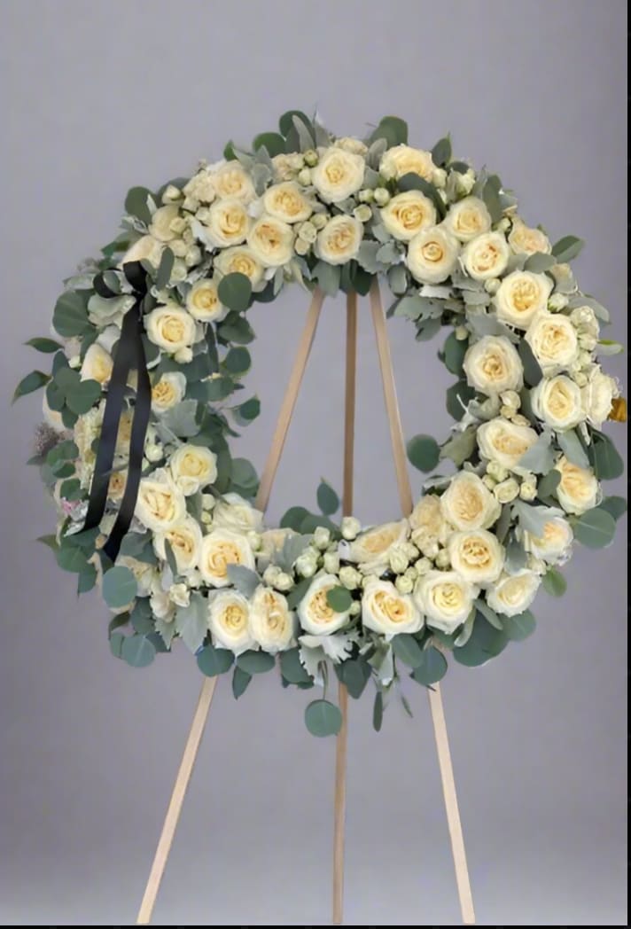 Heartfelt condolonces - Honor the memory of a loved one with our Elegant Sympathy Flower Arrangement