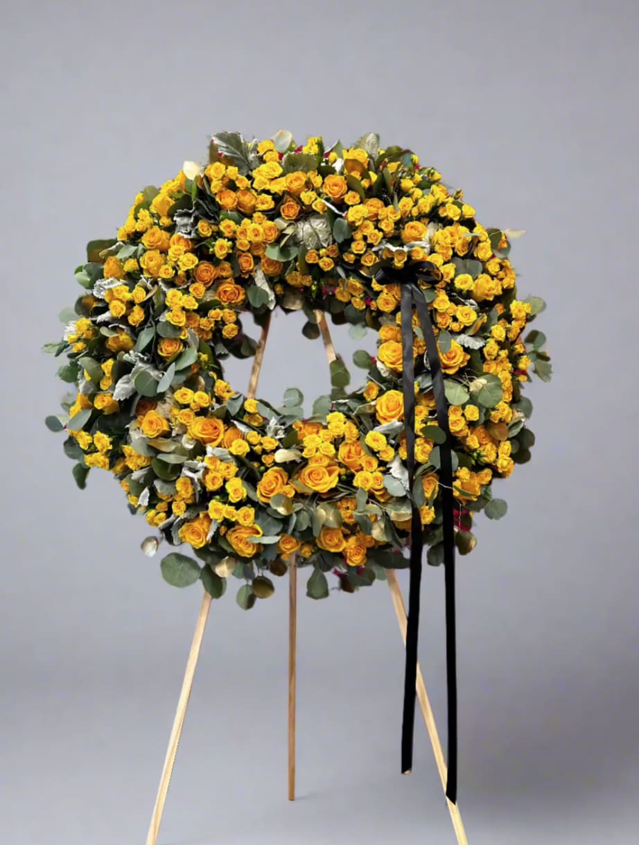 In loving memory - Honor the memory of a loved one with our Elegant Sympathy Flower Arrangement