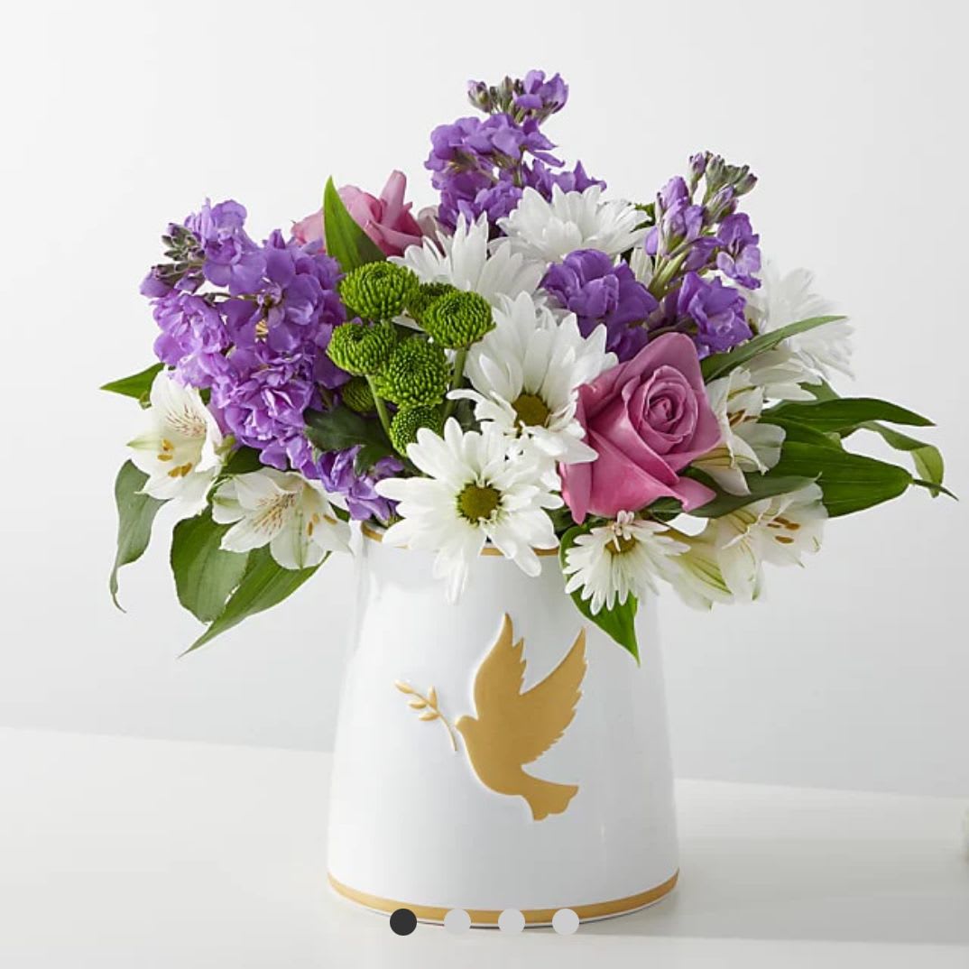 GARDEN OF PEACE BOUQUET By FTD - Through the lush lavender and white stems of the Garden of Peace Bouquet, offer your recipient a moment of tranquility when they need it most. This bouquet is best fit for a home or residence.