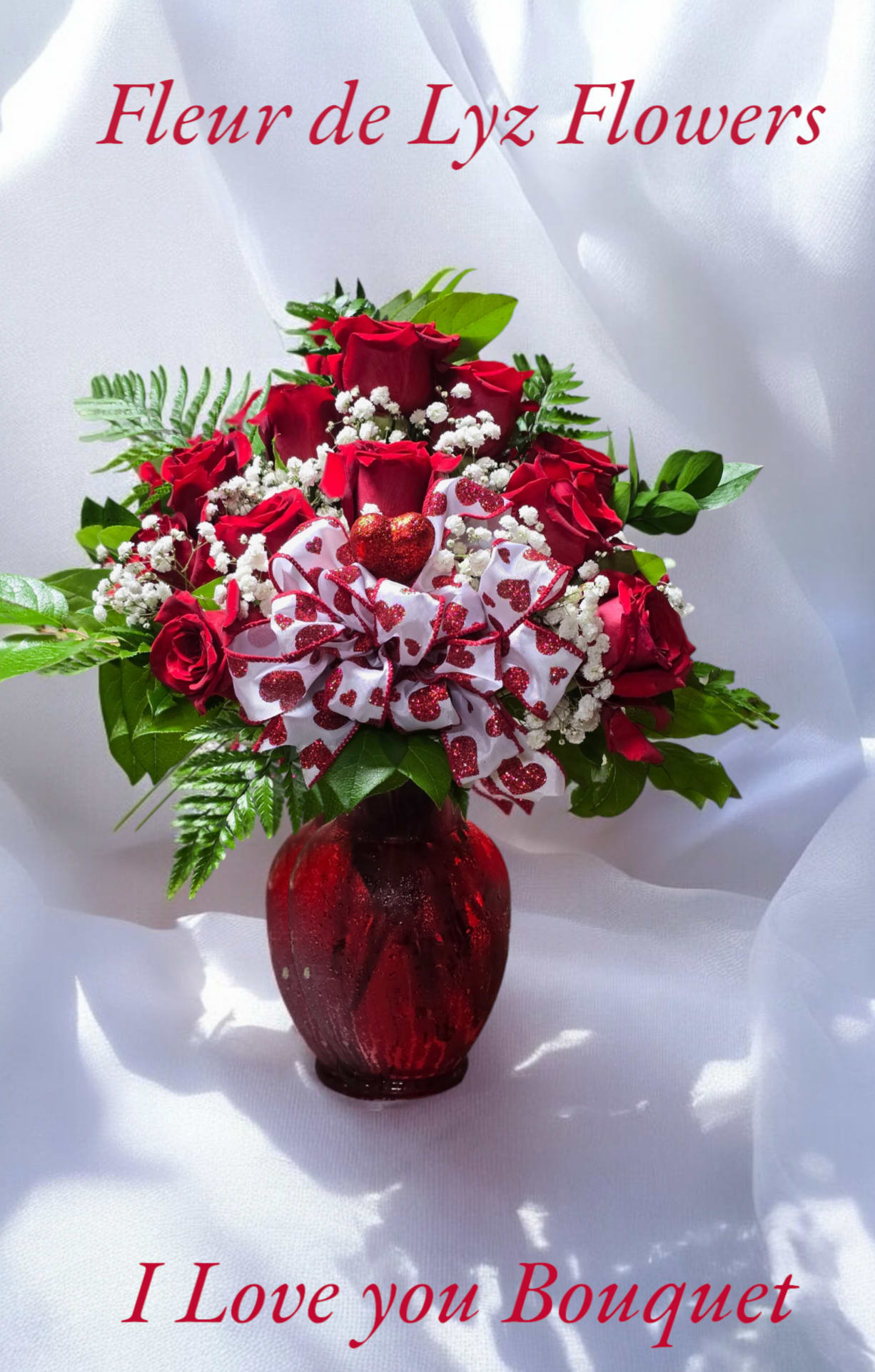 I LOVE YOU BOUQUET I LOVE YOU BOUQUET - A stunning arrangement of a dozen red roses in a beauriful red vase.