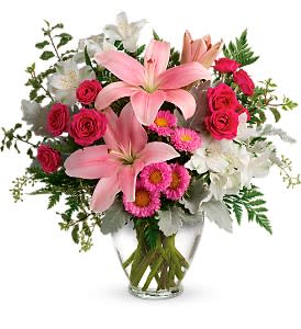  Blush Rush Bouquet [TEV55-5A] - Luxe lilies in a beautifully blushing shade of pink are sure to make them smile, no matter the occasion!  This pretty bouquet features hot pink spray roses, pink asiatic lilies, white alstroemeria, pink matsumoto asters, seeded eucalyptus, leatherleaf fern, dusty miller, and pitta negra. Delivered in a Serenity Vase.  Approximately 16 1/2&quot; W x 15 1/2&quot; H  Orientation: One-Sided      As Shown : TEV55-5A