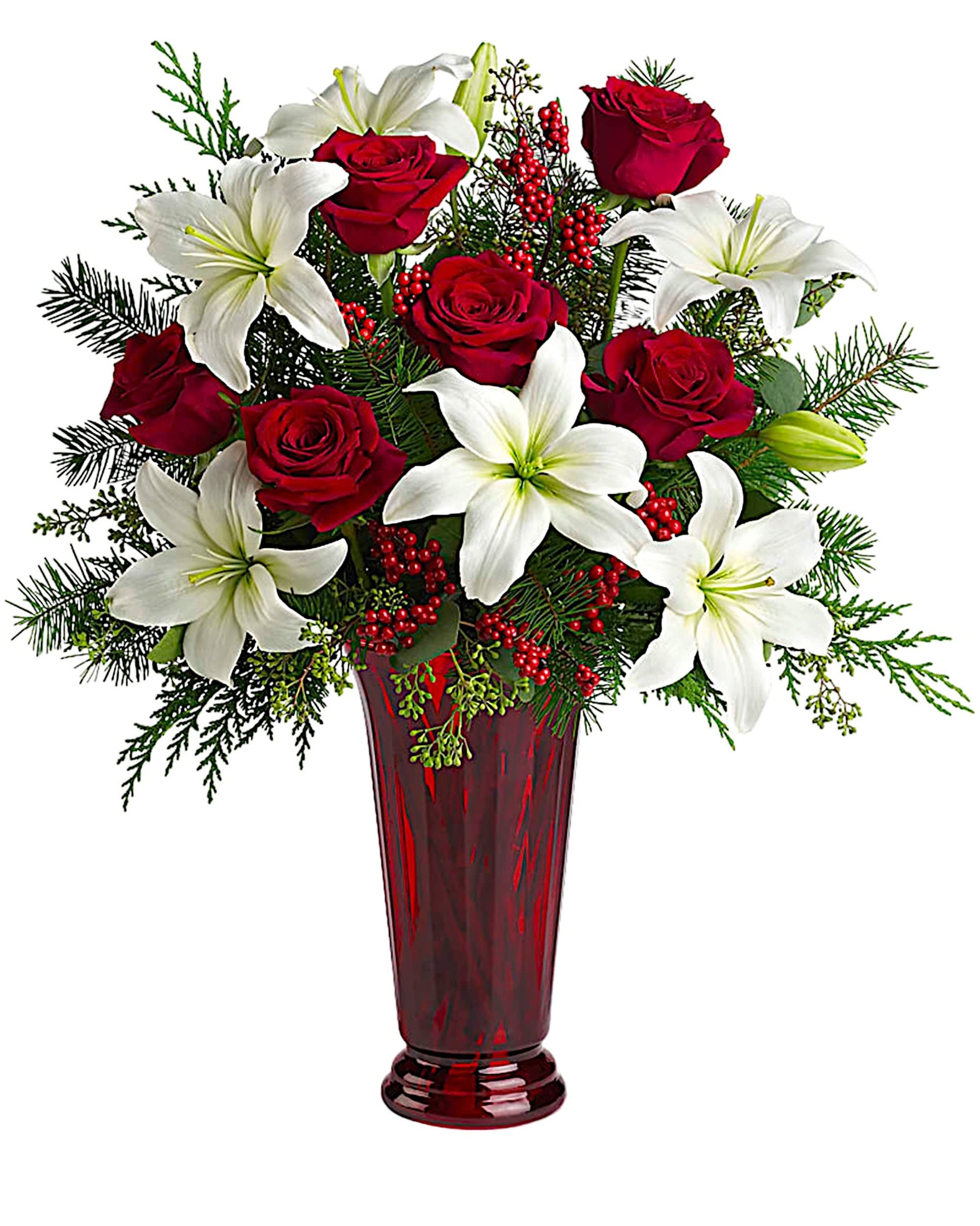 Holiday Magic Arrangement - Send a touch of holiday magic to a special friend or add some to your own home. An elegant Christmas arrangement of white Asiatic lilies, red roses and Christmas greens, this fabulously fragrant gift lends seasonal sparkle to any room.  DETAILS White Asiatic lilies, red roses, Christmas greens, seeded eucalyptus and small red berries are gathered into a ruby red vase to create a versatile, natural piece of holiday décor.  VASE INCLUDED Orientation: All-Around Item #NF-802  FLORIST-TO-DOOR Same day flower delivery on most orders placed online by 12 pm or 10 am on weekends PST.  BLOOM DETAILS Roses Asiatic Lilies Berries Greenery  The Standard Arrangement is approx. 22 1/2&quot;H x 20&quot;W The Deluxe Arrangement is approx. 23&quot;H x 21&quot;W The Premium Arrangement is approx. 24&quot;H x 23&quot;W  How to place an order? 1. You can place an order directly on this secure website OR 2. You can call in your order by dialing: (323) 262 - 9238 OR 3. You can visit our store (appointment recommended 323.262.9238)  NINFA'S FLOWERS 2405 WHITTIER BLVD. LOS ANGELES, CA. 90023  ATTENTION: *Please note that on busy holidays, Valentine's Day, and Mother's Day, we cannot verify if the recipient received the flowers until the following day. You can verify delivery on the website after 10:00 pm, call 323.262.9238 the following day after 10:00 am, or contact the recipient directly. Thank you for your patience and understanding.