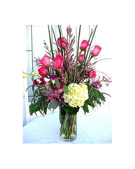Pink Romance - This nice arrangement consists of hot pink roses, orchids and hydrangeas in a tall cylinder glass vase.(Certain flowers &amp; container may be varied &amp; are subjected to availability. Our designers will substitute with something in order to keeping the best presentation). 