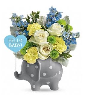 Hello Sweet Baby - Blue - A beautiful boy deserves beautiful blooms! Celebrate his special arrival with this perky, polka-dotted elephant vase, delivered with a gorgeous fresh flower bouquet.