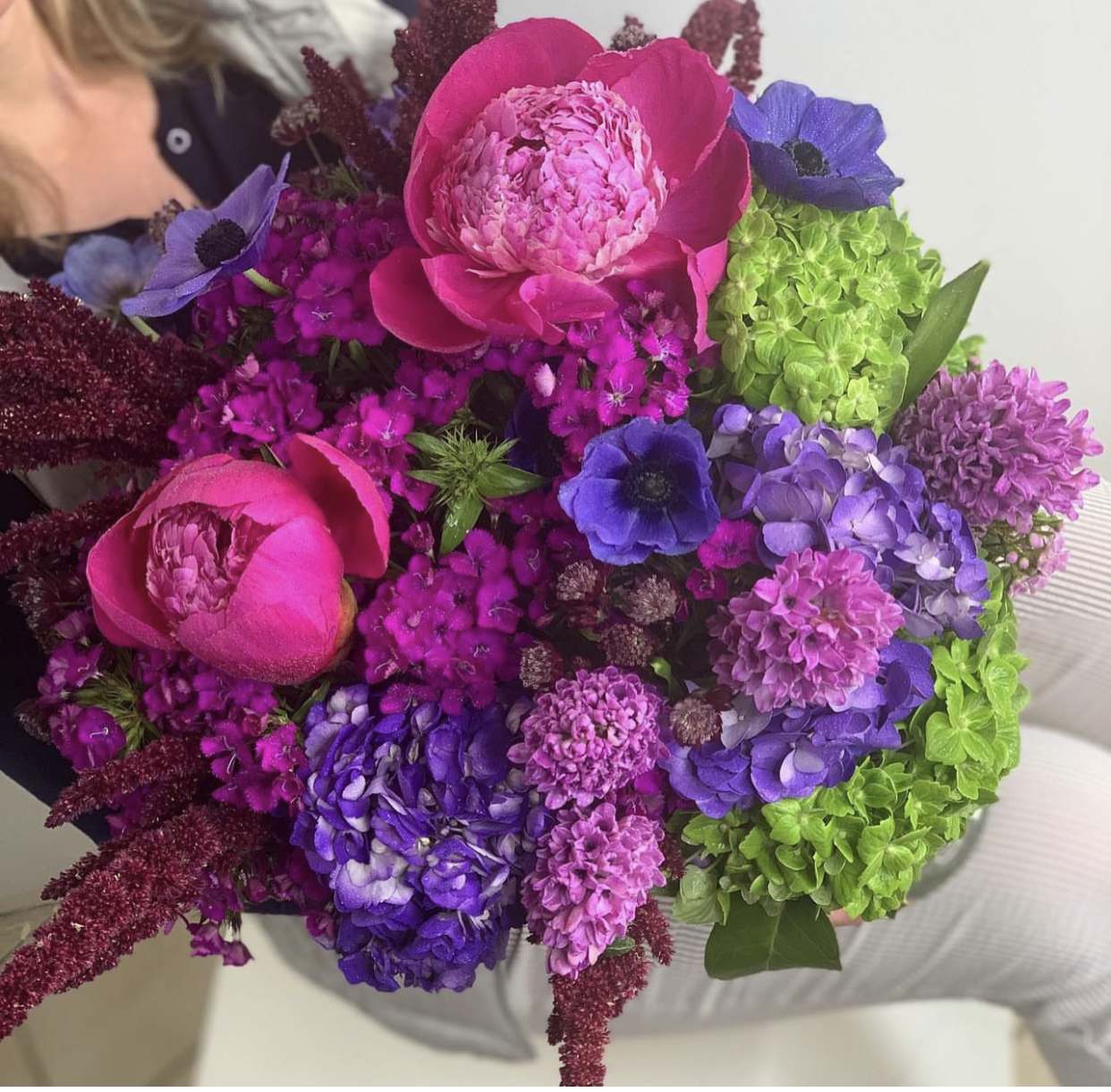 Gloria - Wow, this arrangement will impress the most picky flower admirer and ocean of positive emotions. Deep colors, textures and volume is something what you want for a special occasion.   In some instances, our photo may represent an overall theme or look and include a one-of-a-kind vase which cannot be exactly replicated.  Although the actual bouquet may not precisely match the photo, its temperament will. Occasionally, substitutions of flowers and/or containers happen due to weather, seasonality and market conditions which may affect availability. If this is the case with the gift you’ve selected, we will ensure that the style, theme and color scheme of your arrangement is preserved and will only substitute items of equal value or higher value.