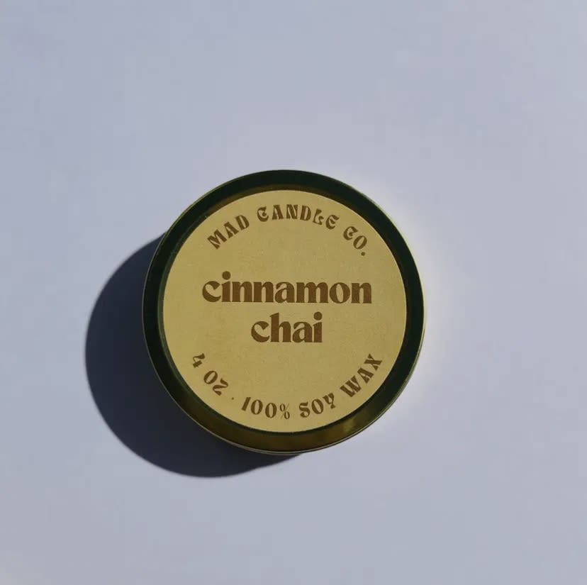 Cinnamon Chai Soy Candle - 4 oz Gold Tin & Wood Wick Cinnamon Chai Soy Candle - 4 oz Gold Tin & Wood Wick - Spice up your space with our cinnamon chai candle. Perfect for cozy nights in or adding a touch of warmth (and fragrance) to any room! Notes: Spicy cinnamon, black tea, brown sugar, and orange peel. PRODUCT DETAILS -4 oz / Burn time: 15 hours / Dimensions: 3.25" L x 3.25" W x 1.25" H -Sustainable crackling wood wick that sounds like a cozy fireplace -Vegan, Cruelty-free, Non-toxic, Paraben-free & Phthalate-free -Hand-poured in Eugene, Oregon