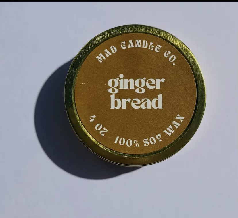 Ginger Bread Soy Candle - 4 oz Gold Tin & Wood Wick Ginger Bread Soy Candle - 4 oz Gold Tin & Wood Wick - Get cozy with our Ginger Bread candle! Rich, sweet scents of buttery molasses and vanilla are balanced with spicy ginger and sugary brown sugar. A sprinkle of cinnamon and clove, plus a touch of creamy milk, creates a cookie-like aroma. You won't be able to resist! Notes: Ginger, brown sugar, molasses, cinnamon, and vanilla. PRODUCT DETAILS -4 oz / Burn time: 15 hours / Dimensions: 3.25" L x 3.25" W x 1.25" H -Sustainable crackling wood wick that sounds like a cozy fireplace -Vegan, Cruelty-free, Non-toxic, Paraben-free & Phthalate-free -Hand-poured in Eugene, Oregon