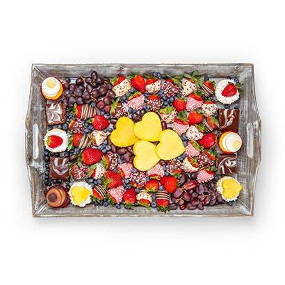 Chocolate Dipped Indulgence Dessert Board Chocolate Dipped Indulgence Dessert Board - We all know sweet things often come in small packages, and this scrumptious board is no exception. Crush those chocolate cravings with all your fresh fruit favorites dipped and decorated to achieve chocolate perfection. A dessert board that makes a great gift or a treat just for you, this is just too sweet to pass up.