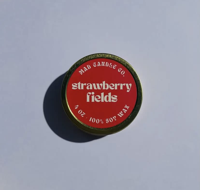 Strawberry Fields Soy Candle - 4 oz Gold Tin & Wood Wick Strawberry Fields Soy Candle - 4 oz Gold Tin & Wood Wick - Experience joy with the best scent of Summer -hand-picked, fresh strawberries infused with the vibrant notes of green leaves and sweet cream. Notes: Strawberry, green leaves, lemon, sweet cream, and light musk. PRODUCT DETAILS -4 oz / Burn time: 15 hours / Dimensions: 3.25" L x 3.25" W x 1.25" H -Sustainable crackling wood wick that sounds like a cozy fireplace -Vegan, Cruelty-free, Non-toxic, Paraben-free & Phthalate-free -Hand-poured in Eugene, Oregon