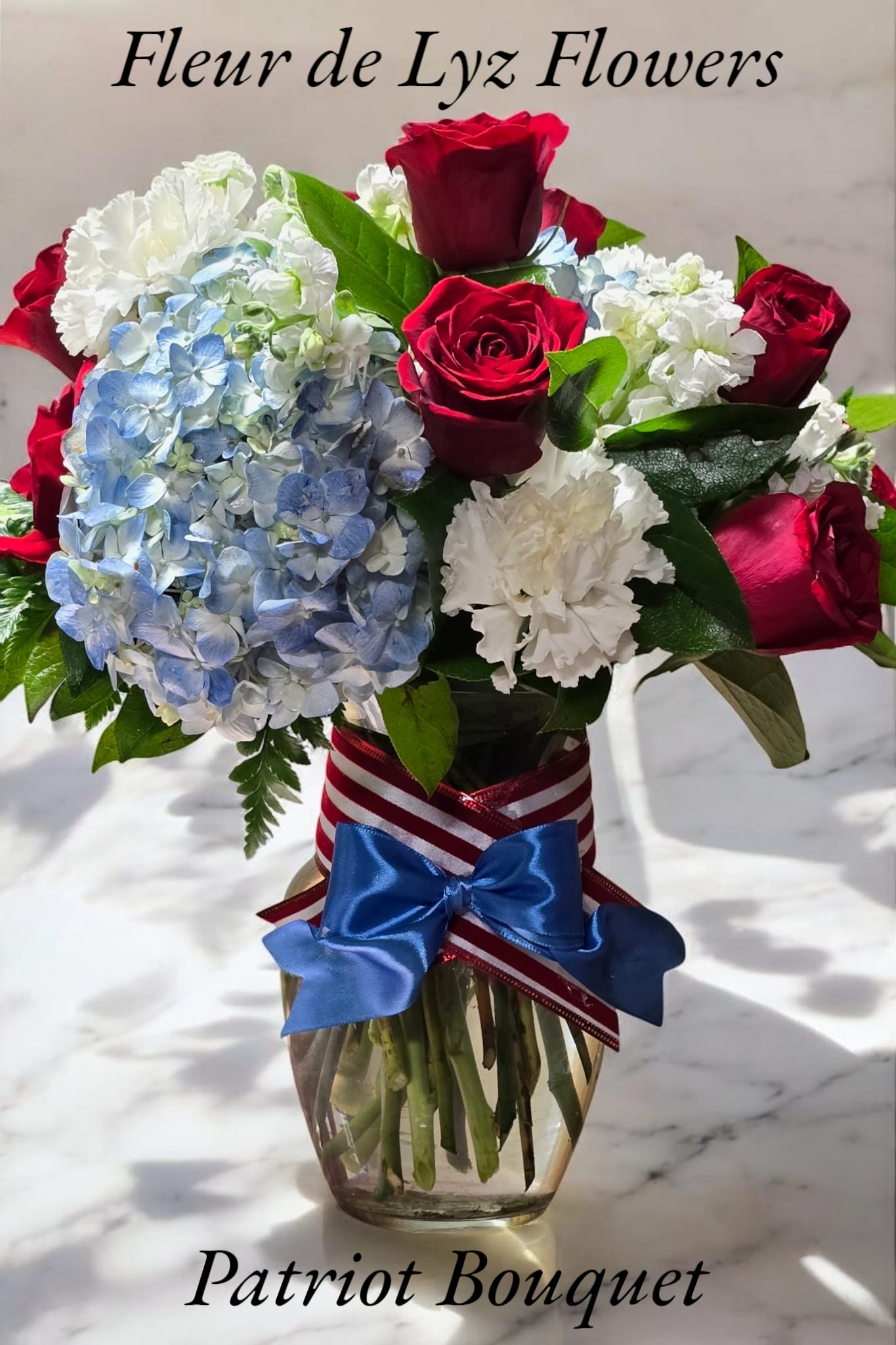 Patriot Bouquet Patriot Bouquet - A beautiful aarrangements which includes Blue hydrageanges, red roses and white an red Carnations.