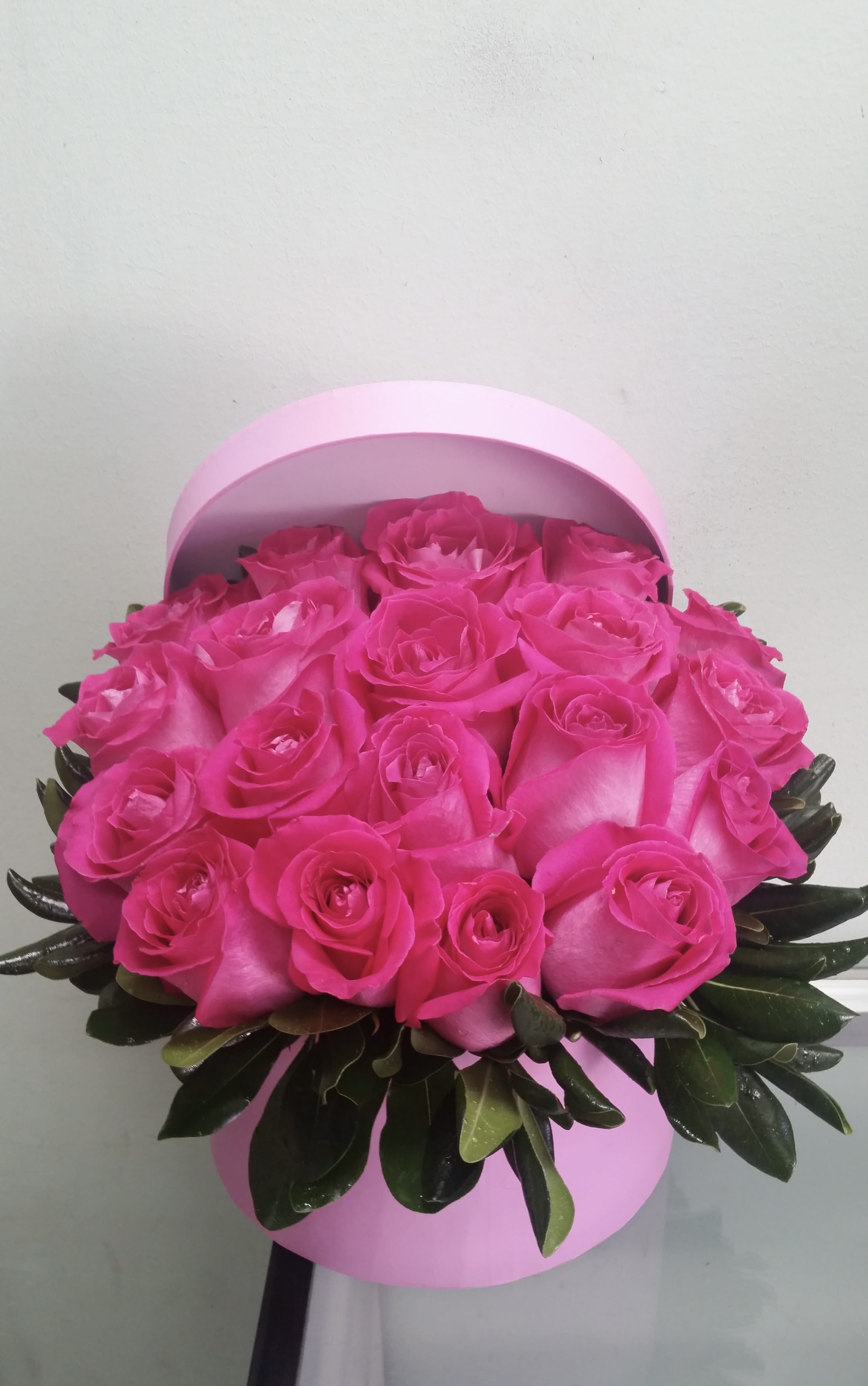 Hot Pink Roses in a Box Hot Pink Roses in a Box - Box arrangement with hot pink roses.
