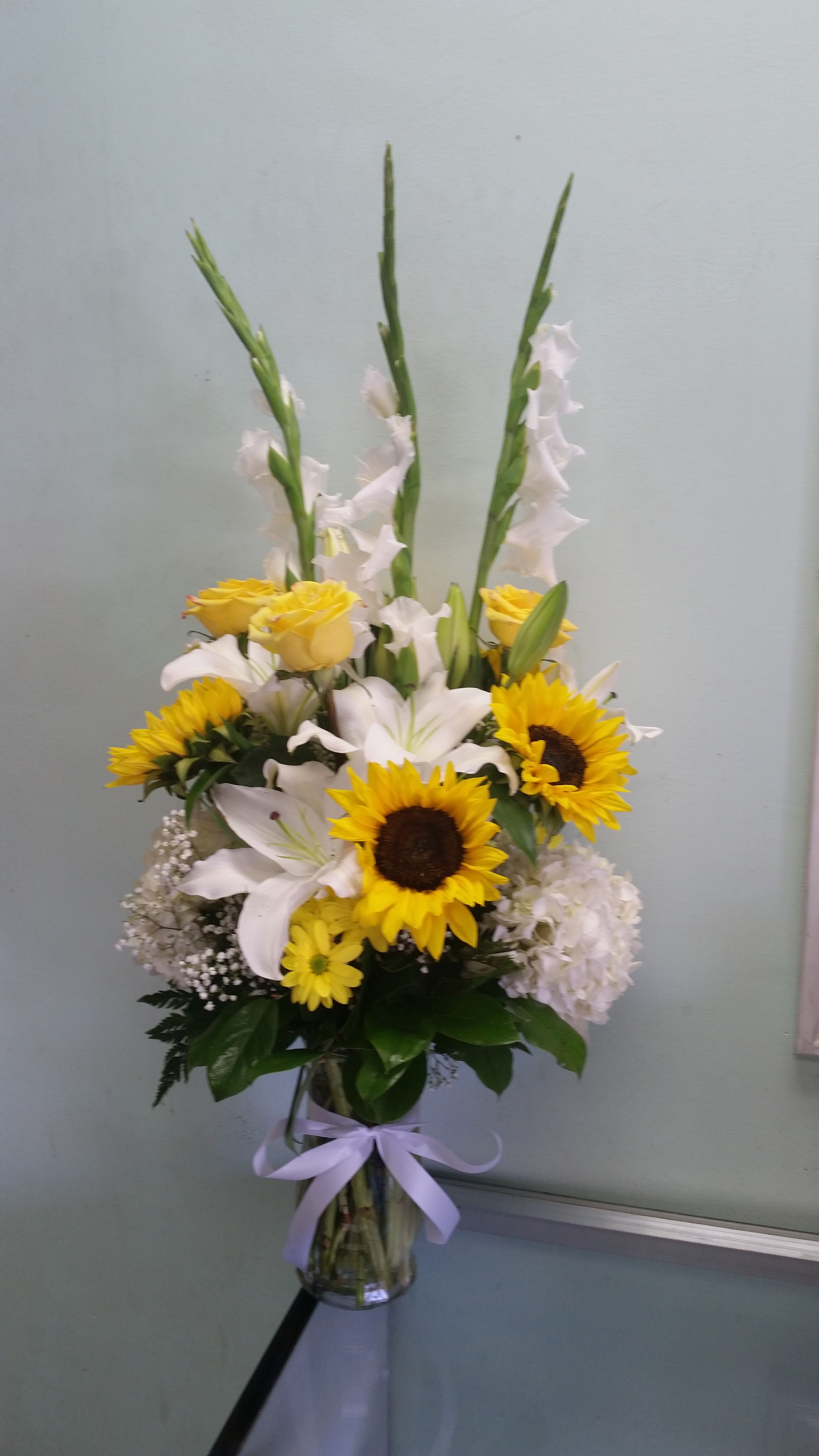 Happy Summer  - Vase arrangement with sunflowers, gladiolus, daisies, roses, hydrangeas, and lilies.