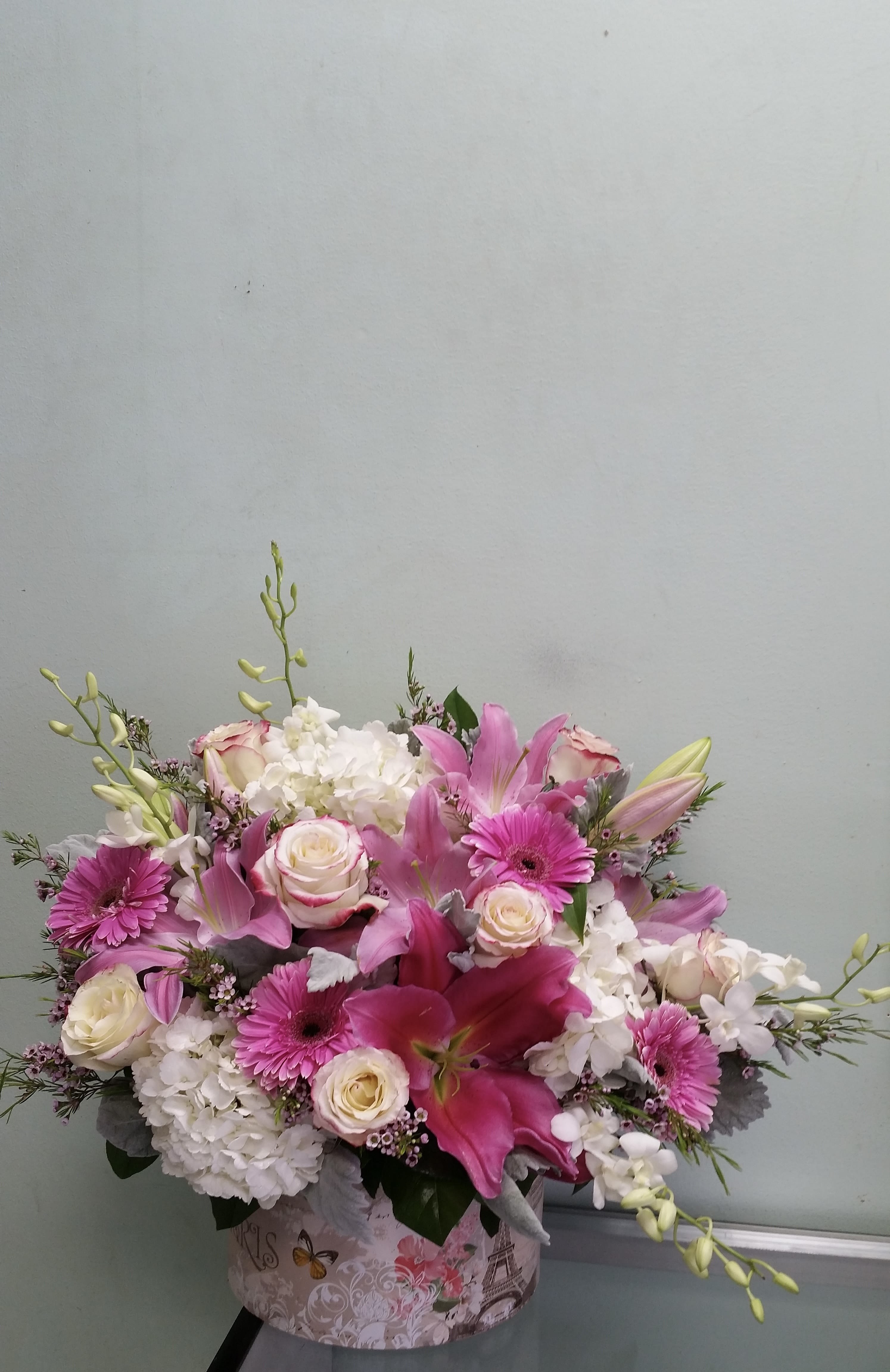 French Beauty French Beauty - Box arrangement with lilies, gerbera daisies, roses, hydrangeas, and orchids.