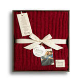 Ribbed Blanket - Red - The Giving Collection® was created to remind others that someone is always in their corner, thinking of them. This thoughtful collection includes handmade gifts created to symbolize the love and support that accompanies each gift. The Ribbed Blanket - Red provides a comfortable design that can be used to cozy up on the couch, keep yourself warm at your desk or to gift to someone you love! Made with ultra-plush materials, this soft and textured blanket is machine washable and easy to care for. Even more importantly, the Ribbed Blanket Red is packaged, ready to gift, with a sweet sentiment that reads, “We all need a little comfort now and then… A reminder to hep us know that we are not alone in the world… That someone is in our..” This unisex gift adds a pop of color that makes the perfect gift for Christmas, Valentine’s Day, birthdays, gift baskets and more.