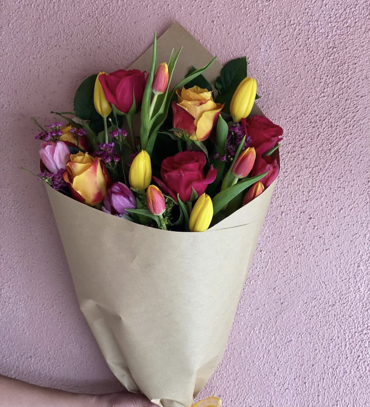 Roses &amp; Tulips - colorful tulips and roses with greenery all beautifully wrapped in brown paper.