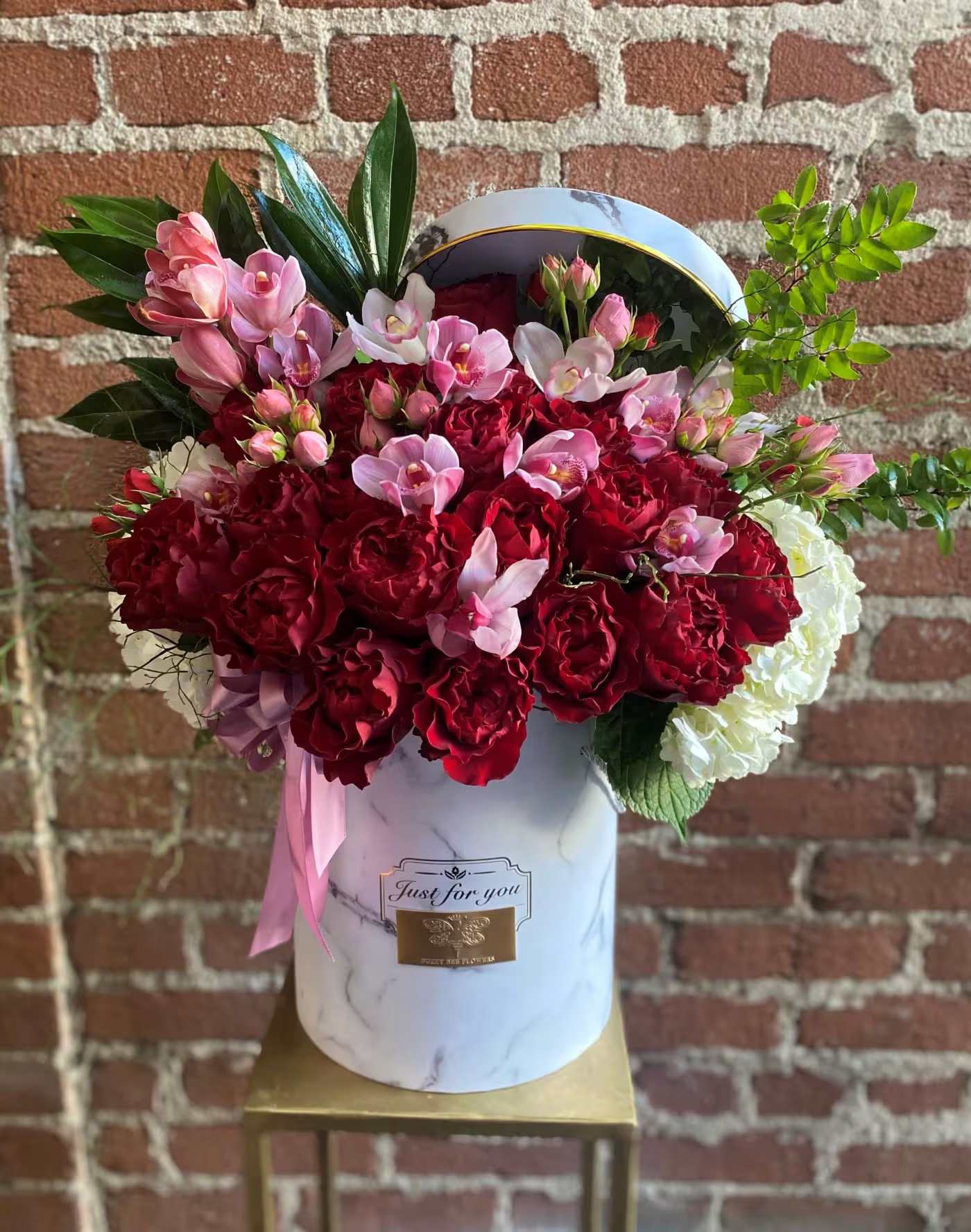 Fairytale - Simi Valley Florist Fairytale - Simi Valley Florist - This beautiful arrangement is designed to deliver happiness to a loved ones day. Filled with beautiful Roses, Orchids and other beautiful flowers this box is customized to perfection, this arrangement is a showstopper! If you want to turn heads then this is the arrangement for you!