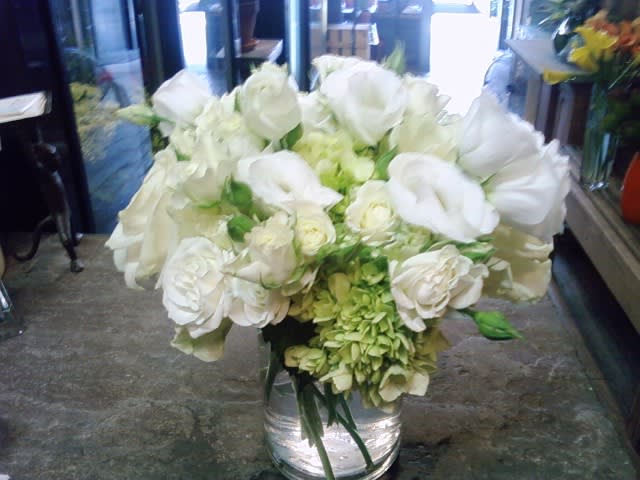 White arrangement White arrangement - An arrangement of all white flowers, low and lush design.